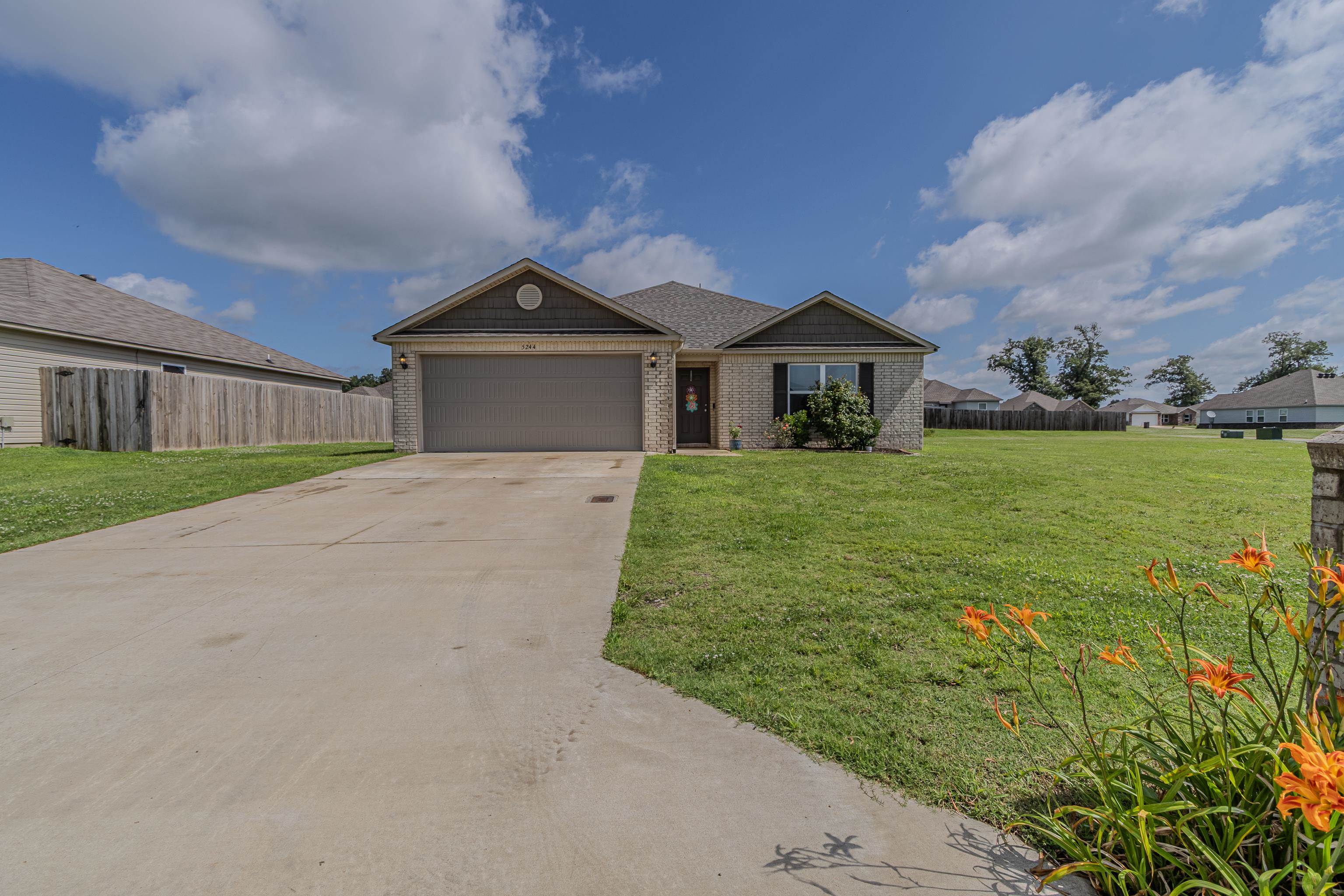 Welcome to the market, 5244 Prospect Trail in the highly sought after Prospect Farms subdivision in Jonesboro, Arkansas! This newer construction home was built in 2021 and features three bedrooms, two full bathrooms, and a spacious open-concept living/dining floor plan. Nestled on an extra-large corner lot boasting almost half an acre, this gorgeous all-electric home has been meticulously maintained and is move-in ready for its new owners! Throughout the home, you'll enjoy a neutral color scheme, luxury lvp flooring, gorgeous granite countertops in the kitchen, as well as a large breakfast bar and stainless steel appliances. Relax on the covered back porch while the steaks sear to perfection! Whether you're an investor seeking to add a clean, turn-key property to your portfolio, a first-time homebuyer looking for move-in ready in a fantastic Hilltop location, or downsizing for minimal maintenance with top tier charm - this home will be loved by all! Call your favorite agent today to schedule a private tour!