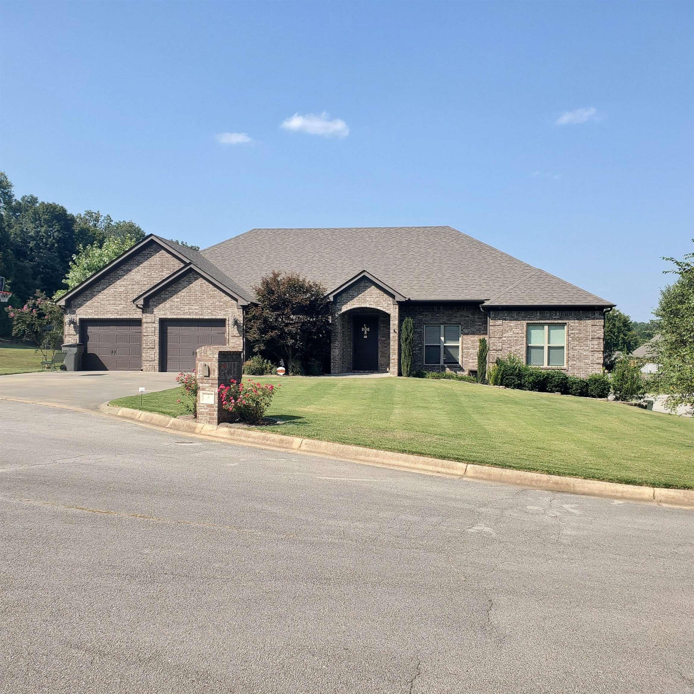 Take a look at this Beautiful New Listing. Three Bedroom Two Baths and a two car garage. Fenced in Backyard and a New Deck just recently added. Great looking Kitchen that a large amount of Cabinets. Granite counter tops as well, all appliances stay including the refrigerator. Split floor plan,, walk in closets and one closet that is very nice with double doors. Walk in Shower in the master and a tub . The other bathroom has the shower in the tub. New Roof was added about three years ago and the Sunroom was enclosed. Brand New HVAC and duct work was replaced as well. Gas Fireplace and beautiful Hardwood floors and carpet in the bedrooms and Tile in the kitchen, bathroom and laundry room.