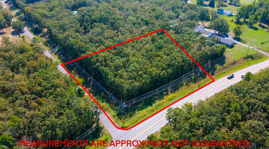 2 wooded acres on the corner of Hwy 5 and Memory Lane.  Build your dream home on the private dead end road off of Hwy.  Close to town, shopping, restaurants and schools.