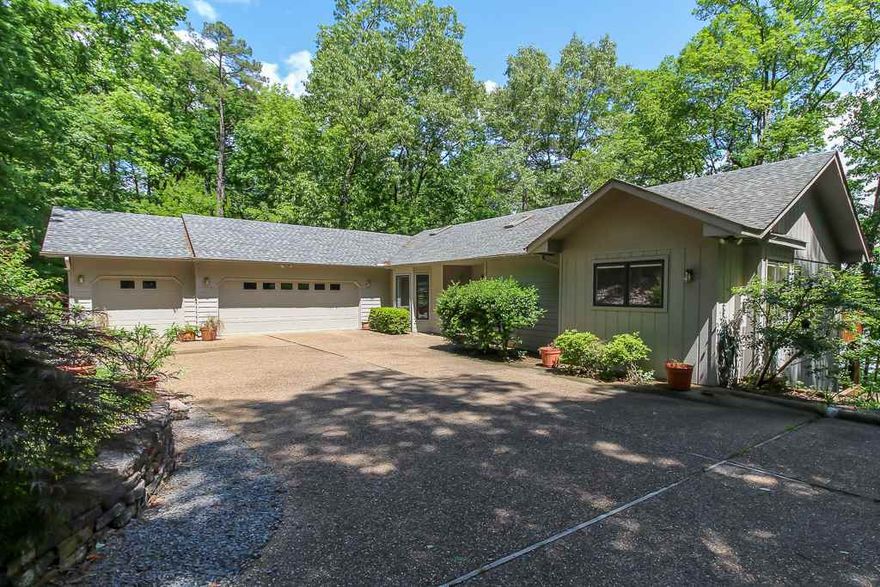 Always dreamed of living on the lake? Here is your chance. Lake Cortez custom designed home. Entry level offers large living area with fabulous view, convenient entertainment friendly, organized kitchen ,formal dining area and  eat in kitchen, sunroom , open deck and master suite. Lower level hosts guest bedrooms, family room and office area. Lots of additional store space.