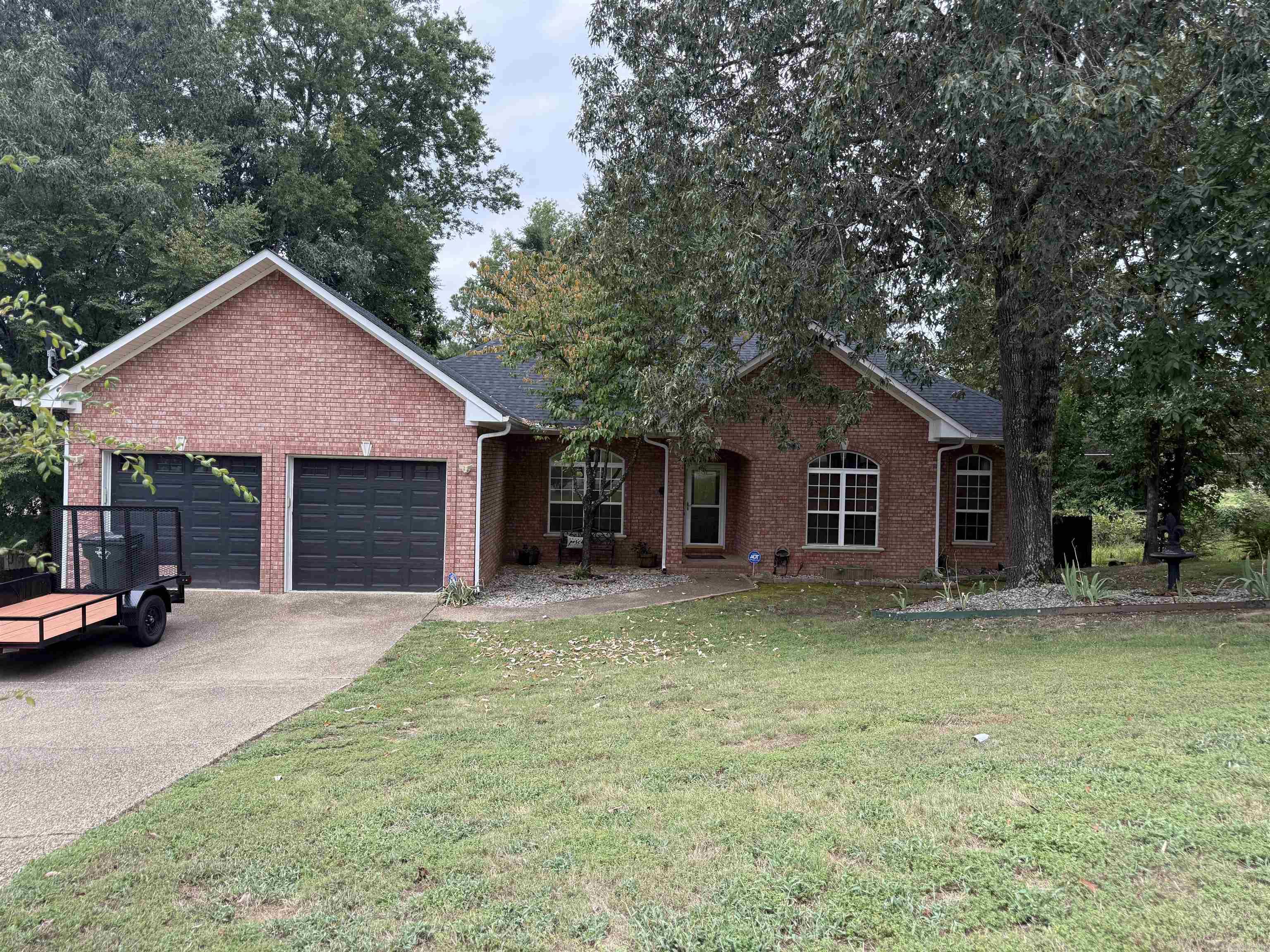 Charming and move-in ready, this 3-bedroom, 2-bath home offers comfort, convenience, and updates that matter. A brand-new roof installed in 2023 along with a new water heater ensures peace of mind, while the HVAC system, only 7 years old, keeps things comfortable year-round. Inside, you’ll find a spacious layout with an updated kitchen featuring a new dishwasher and microwave—perfect for easy living and entertaining. The dedicated laundry room includes a utility sink for added functionality. Step outside to enjoy the large covered deck, complete with a mounted TV—ideal for relaxing evenings or weekend get-togethers. Out back, a separate shop provides space for hobbies, storage, or projects. This well-maintained home combines modern upgrades with practical features, making it a great fit for families, first-time buyers, or anyone looking for a turnkey property with room to grow.