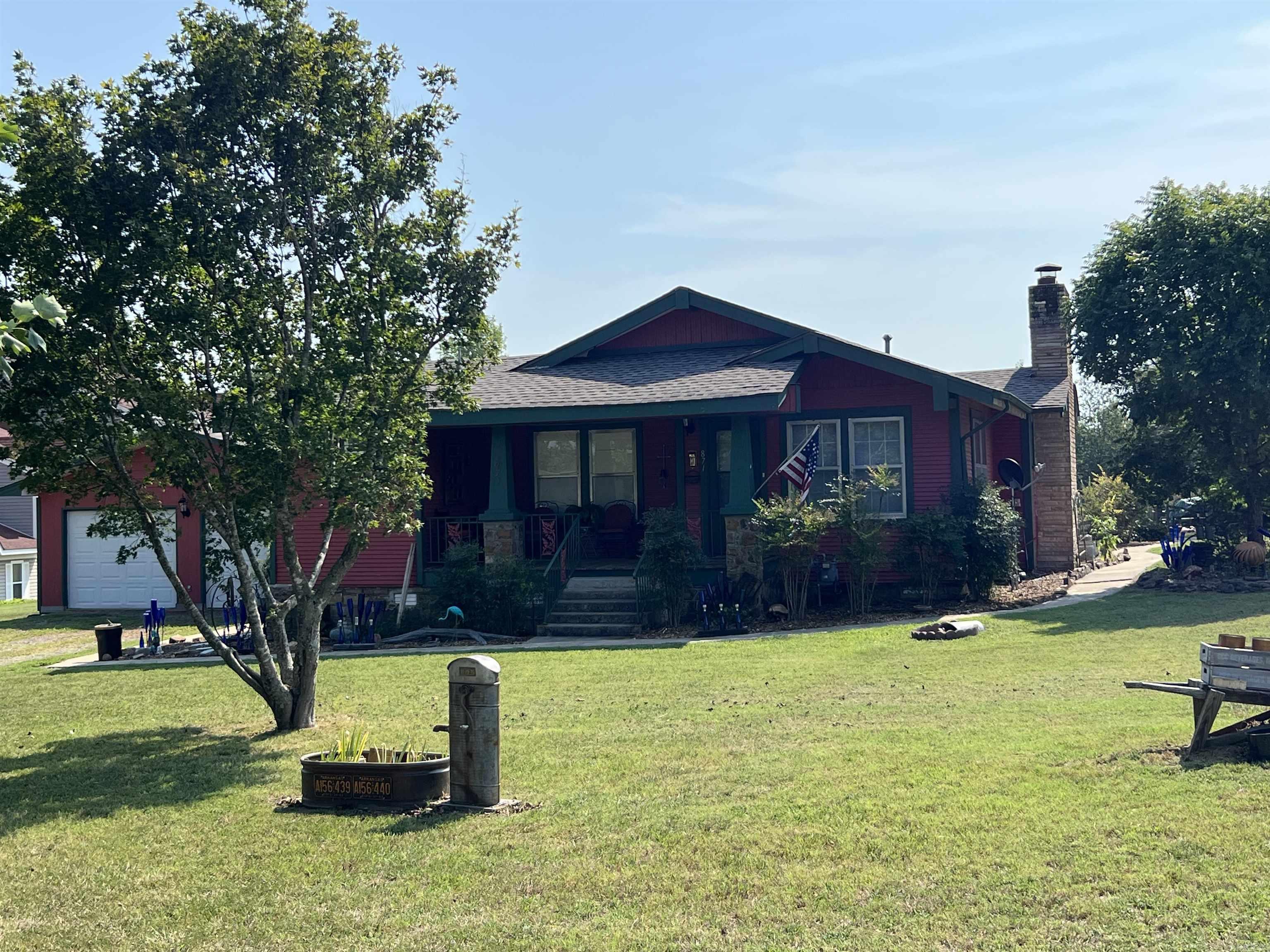 Great commercial opportunity in the heart of Clinton just minutes from shopping and dining. Highway 65 has approximately 18,000 vehicles per day traveling. Property could be a home business with living quarters. Great garage with workshop/man cave; original barn and storm shelter with a huge level backyard. Come view this home today!