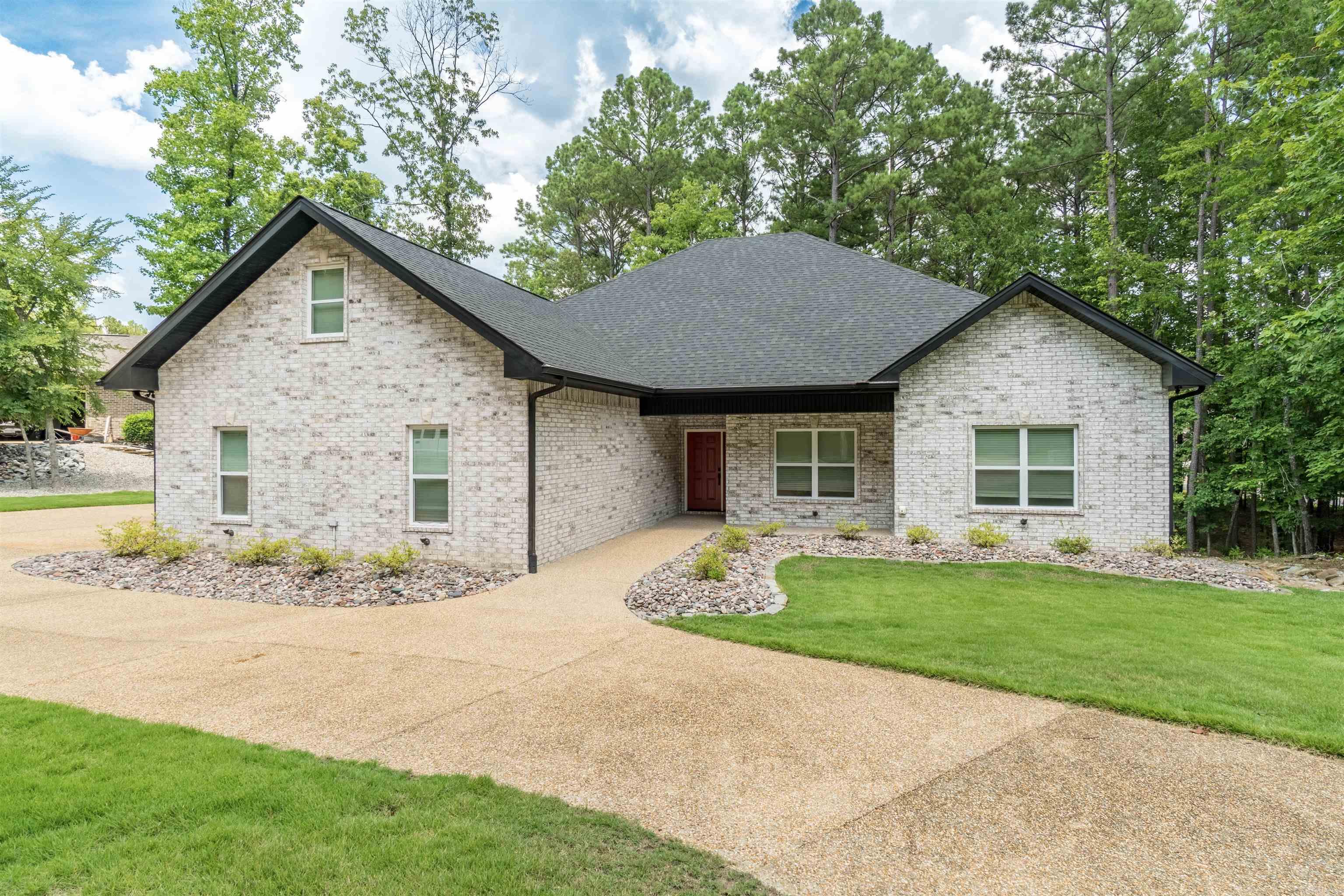 Located on the East side of the beautiful Hot Springs Village. This perfectly maintained home built in 2021 offers a wonderful mixture of elegance and comfort. This floorplan offers an open concept between the living room, dining, and kitchen, and boasts large bedrooms for all the interior comfort you could hope for. Or relax with a private back porch setting. This level lot provides a beautiful mixture of rock and grass for easy maintenance with a pristine look. Come experience all the happiness and amenities the Village has to offer and make this your forever home! Copy and paste the Link to view the floorplan with associated click to view pictures based on the room! FLOORPLAN TOUR: https://unbranded.visithome.ai/i3xCGZapUE9PQSCaE9x4mn?mu=ft&t=1754001638