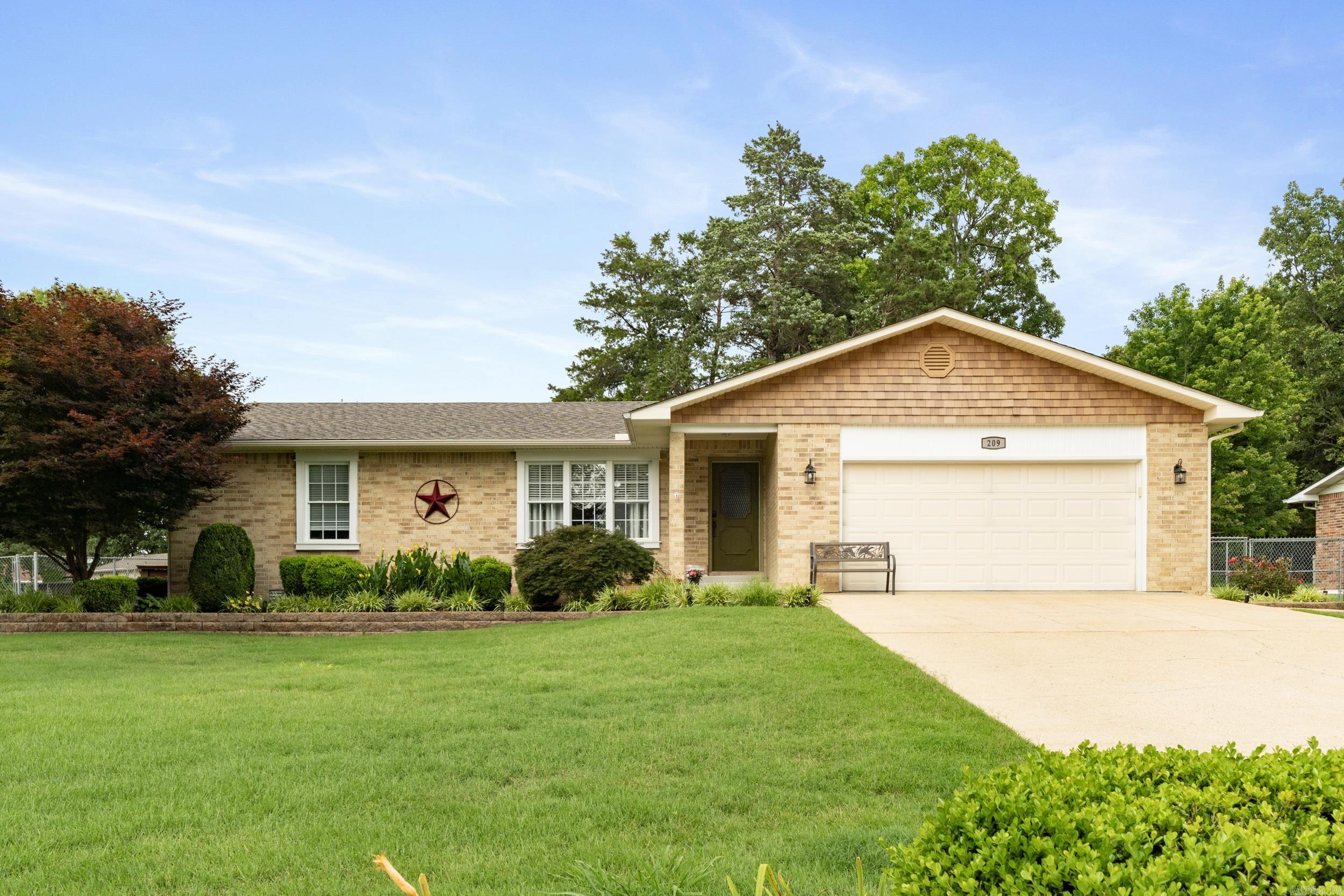 Indian Creek charm meets modern luxury! This 2 bed, 2 bath home offers custom finishes, updated kitchen and baths, wood floors, and designer details throughout. Brick exterior, quiet setting, and 2-car garage—move-in ready!