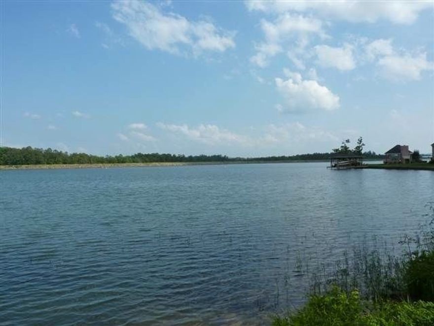 GORGEOUS LEVEL CORNER LOT ON LAKE BALBOA WITH A GREAT VIEW OF OPEN WATER AND DAM! ENJOY THE VIEW OF WATER AND WOODS!! 92 FEET OF LAKE FRONTAGE IN AN AREA WITH FANTASTIC HOMES!! JUST A QUICK BOAT RIDE TO BEACH, RESTURANT, AND MARINA! JUST MINUTES TO 9 CHAMPIONSHIP GOLF COURSES, FITNESS CENTER, POOLS, TENNIS COURTS, AND 26 MILES OF WALKING TRAILS! PERFECT FOR YOUR CUSTOM HOME!