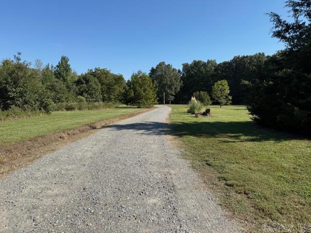 Very nice 7.4 acre home place ready for your camper or new home located on county road frontage. Rural water, high speed internet, First Electric, all located on the property. This country setting is only 10 minutes from Carlisle.