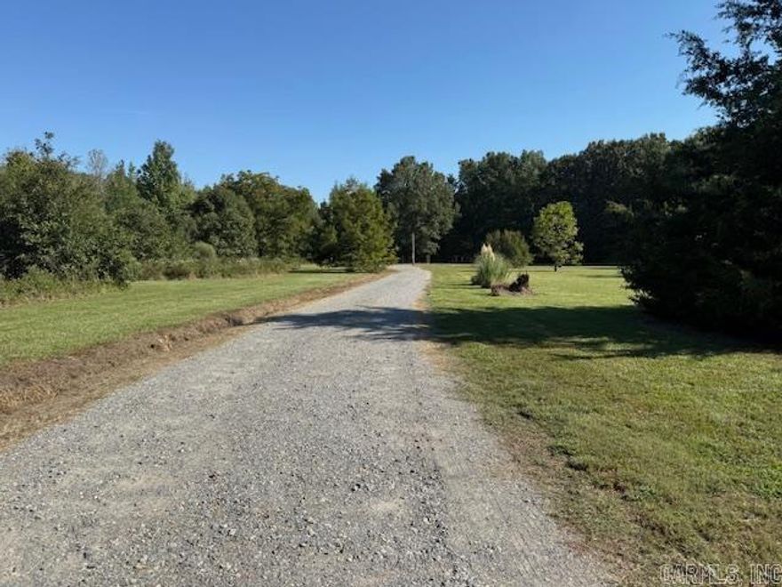 Very nice 7.4 acre home place ready for your camper or new home located on county road frontage.  Rural water, high speed internet, First Electric, all located on the property.  This country setting is only 10 minutes from Carlisle.