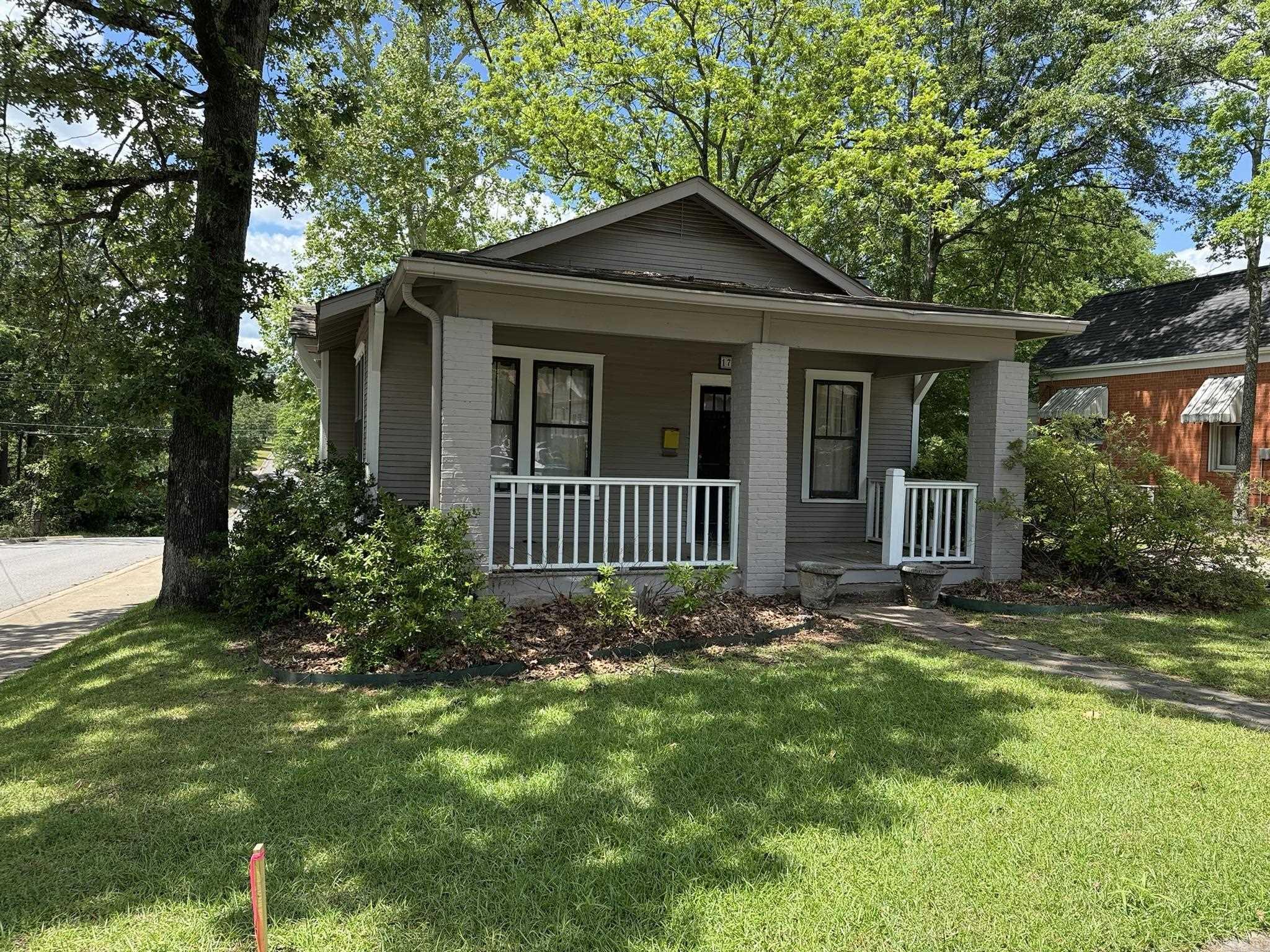 Charming two-bed, two-bath home a block from Forest Park Elementary. Gas range and oven, refrigerator with ice maker, dishwasher, laundry room with washer and dryer. Breakfast nook with under window seating. Living room has a wood-burning fireplace and skylight. Dining room off of living room could be used as third bedroom. Primary bedroom has vaulted ceilings and French doors. Original hardwood floors. Must see!