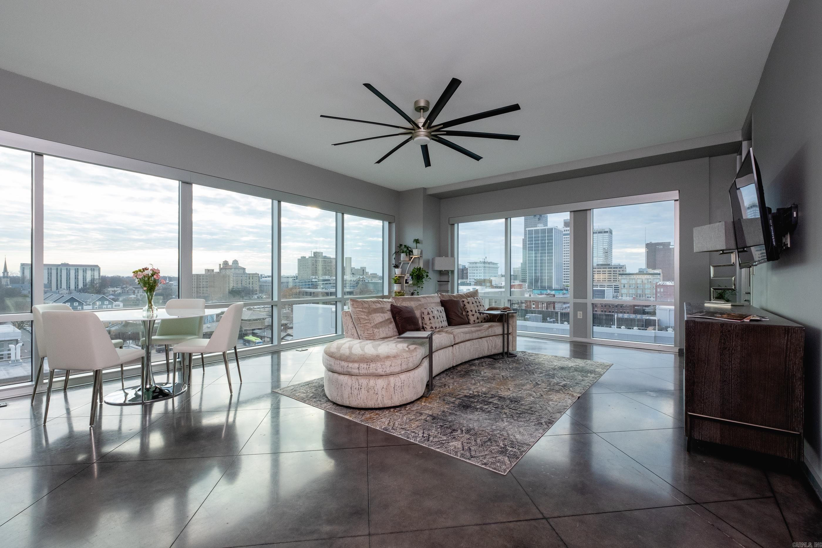 High-rise 2BD/2BA condo in downtown Little Rock that is waiting for you to call home. End every day with breathtaking sunset views in the comfort of your own living room. Large windows throughout with remote controlled motorized shades to take it all in. Open kitchen and living area with wet bar ideal for entertaining. Sleek quartz countertops in kitchen. Plenty of closet space in bedrooms. Heated floors in bathrooms to keep your feet warm and toasty. Covered garage parking with two spaces. Full time concierge, security, and on site handyman. Enjoy summer days out by the pool or, for those with a green thumb, a community garden onsite. Basketball, pickleball, and tennis courts included. Brand new gym and party room available for use! Monthly POA fees and water included. Downtown living at it's finest! See the best that Little Rock has to offer, literally out of your windows. Appointment only showings. For sale by River Rock Realty and for lease by Hoffman Team management. Beware of scammers - we will never ask you to Cashapp us money. The lease for this property is flexible. Income must be 3x the amount of rent.
