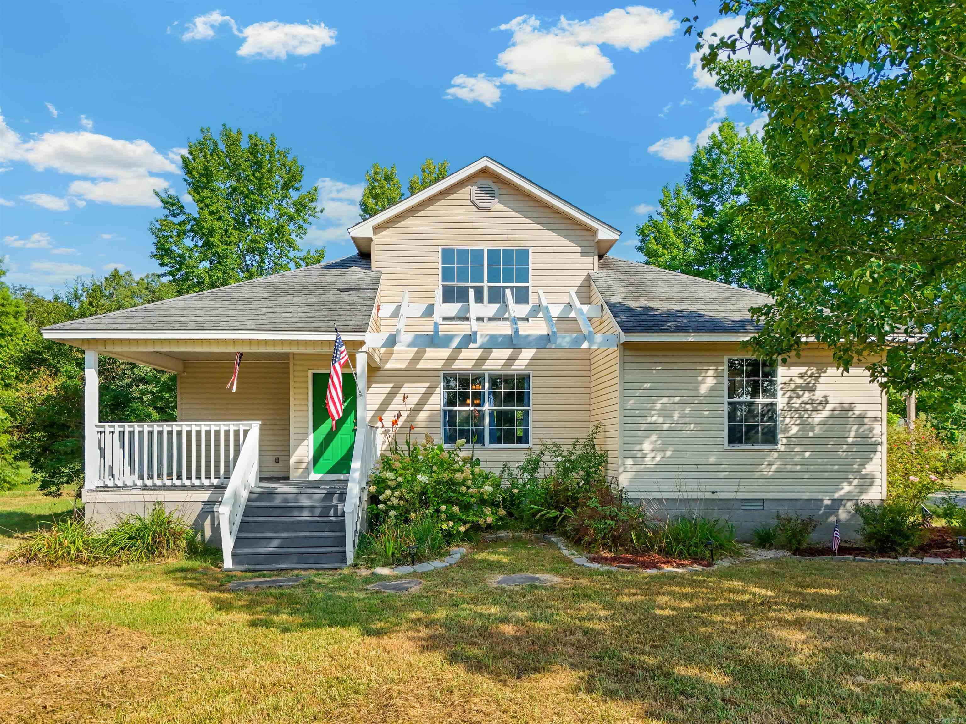 Charming 4 Bed, 2 Bath home on 3.25 acres, peaceful setting with modern updates. Nestled at the end of a quiet cul-de-sac in a friendly neighborhood, this home offers the perfect blend of country tranquility and modern conveniences. Located in Vilonia School District, this property sits on a level lot with wooded land surrounding the property lines. Teeming with wildlife, perfect for nature lovers and those seeking privacy. Inside, you will find fresh paint, new flooring throughout, and a brand-new water heater and garbage disposal (all 2025 upgrades). Three bedrooms including the Primary bedroom are located downstairs, while the fourth bedroom is located upstairs with a dedicated office space. Only 25 minutes from shopping and restaurants in Conway, this home will offer the peaceful lifestyle you want with the amenities you need!! Don't miss your chance to own this hidden gem. Be sure to check out the links for 3D tour and drone video.