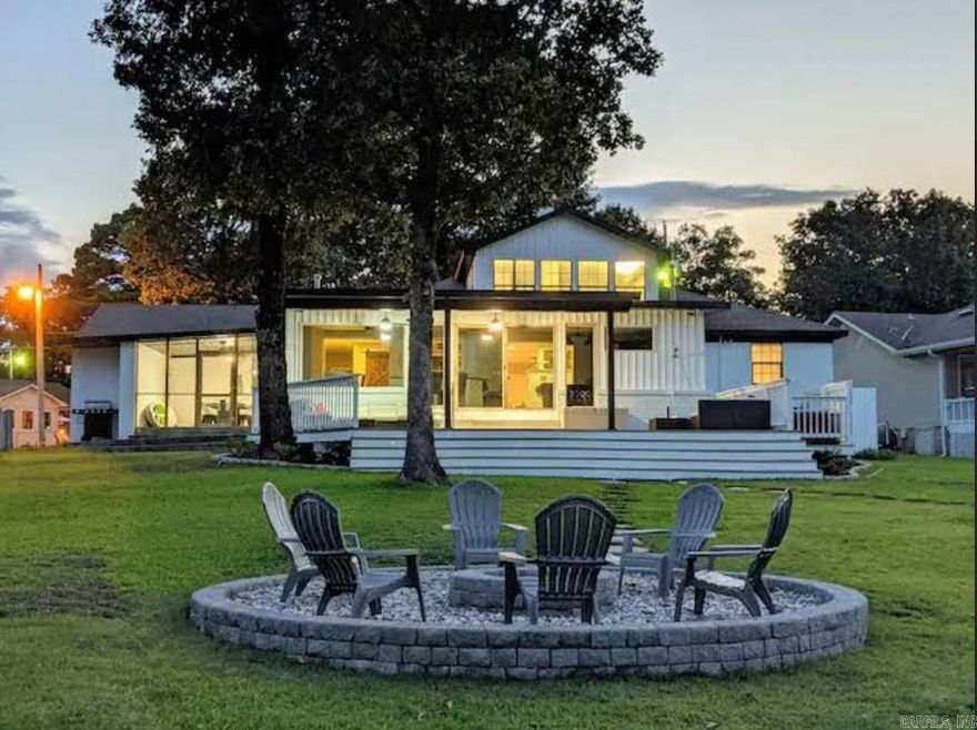 Discover the ultimate lakefront escape with this stunning 5-bedroom, 4-bathroom home in a highly sought-after destination. This extremely successful STR comes fully furnished and grosses six figures annually, making it a rare turnkey investment opportunity. Designed for both relaxation and entertainment, guests can unwind by the fire pit on cool evenings, enjoy a game of pool inside, or take in the serene lake views from nearly every room. With spacious, well-appointed interiors and direct water access, this property is perfect for investors looking for a high-performing rental or buyers seeking the perfect lakeside getaway.