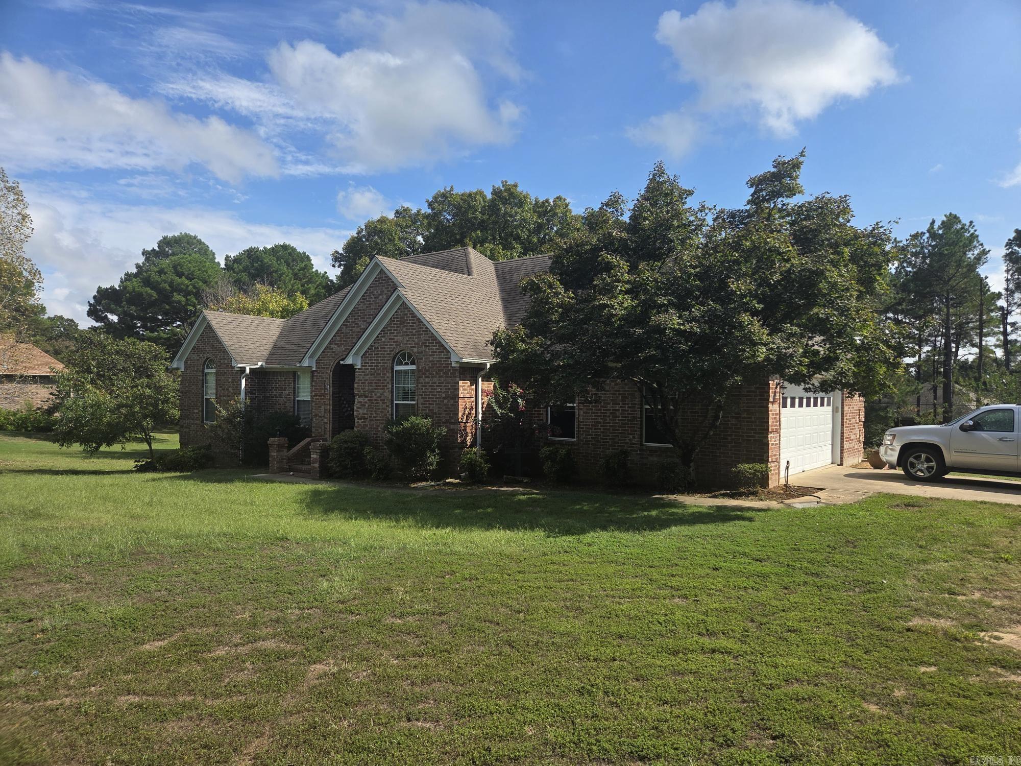 Well-built 3 bed, 2 bath brick house in sought after area of Club West Estates. This house has a separate laundry & separate dining with a vaulted ceiling. There is a large deck off the living room on the back of the house for relaxation with a good view of the yard. The HVAC has been updated; gas water heater replaced 2 years ago & an 18 x 20 basement for storage. Additional storage under the covered deck. The primary bedroom has a trey ceiling with attached bathroom that has a garden tub, stand-up shower, 2 sinks & 2 walk-in closets. House will be sold "AS IS" with CASH, Conventional or In-House loan only. No repairs can be made & no seller property disclosure available. Appointment only with 24-hour notice required. No inside photos available.