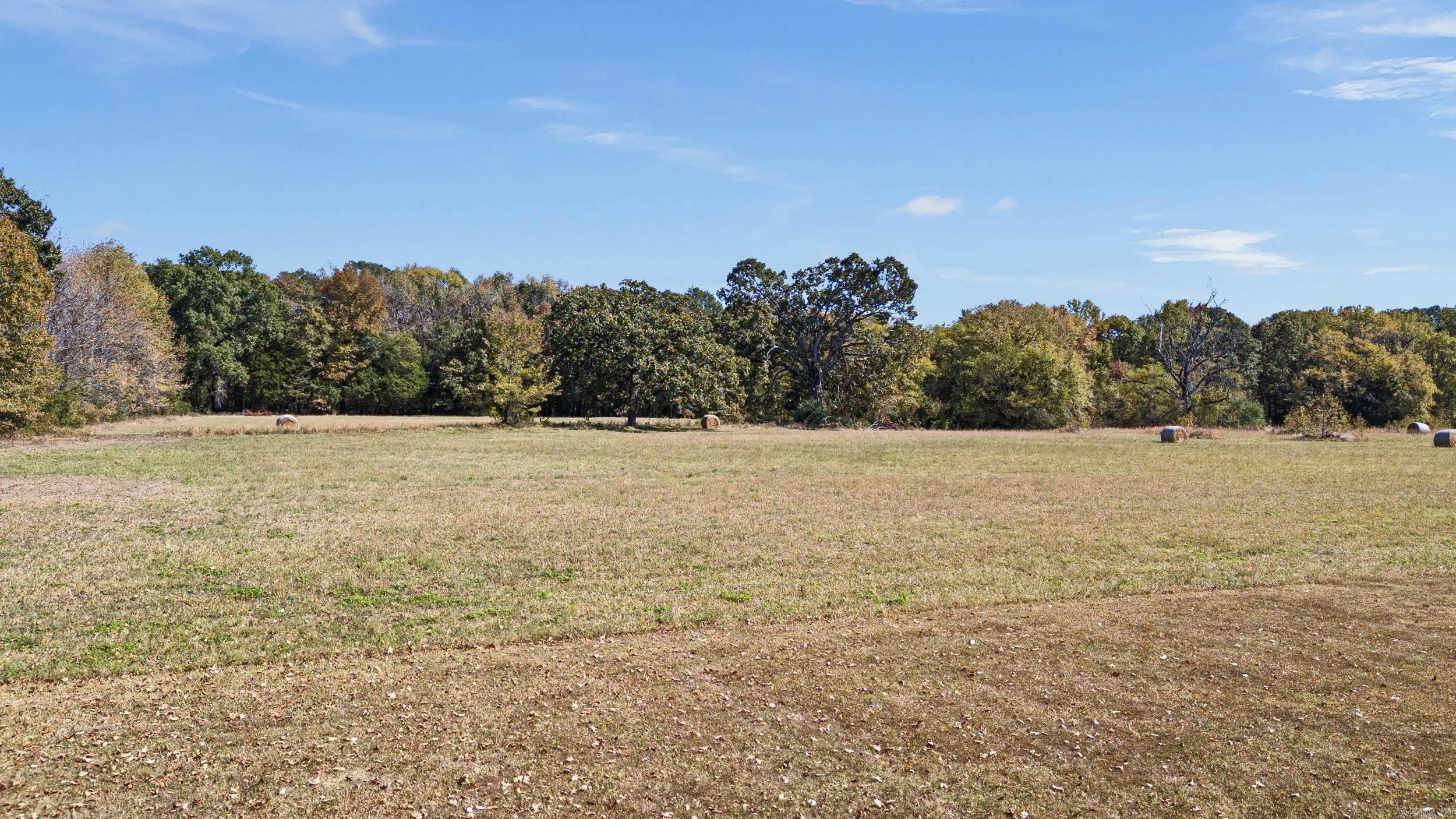 Discover the perfect setting to build your dream home on these 5 spacious acres, ideally located just a mile from Pottsville Junior High and High School. With ample room to create the lifestyle you've always envisioned; this property offers convenience and the open space while being minutes from local amenities. The possibilities are endlessāmake this land the foundation of your future today!