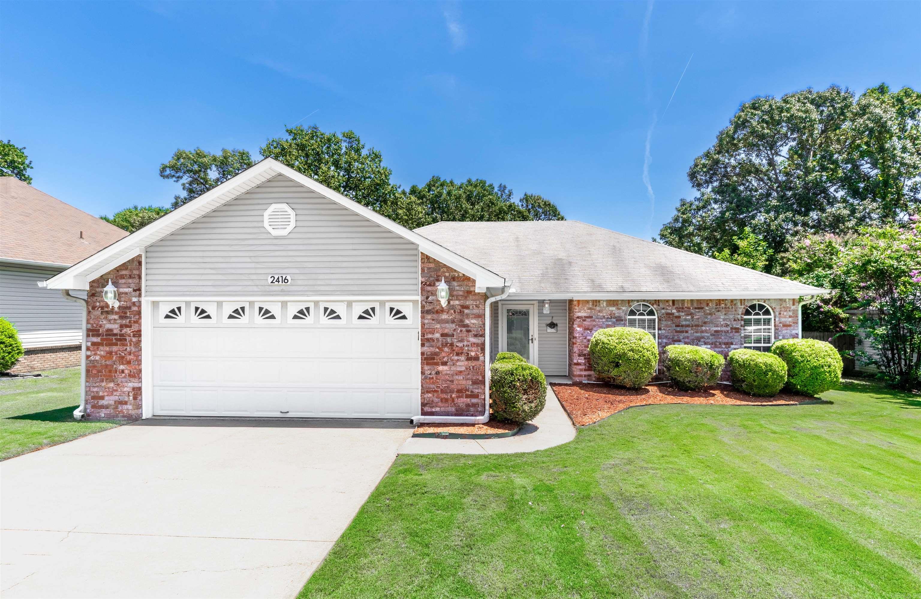 Beautifully maintained 3-bedroom, 2-bath brick home designed with family living in mind! This one-level, move-in ready home features an open concept layout with a spacious living room, vaulted ceilings, and a cozy brick fireplace — perfect for gathering and making memories. Fresh paint throughout and no carpet make it both stylish and easy to maintain. New faux wood blinds in all the windows! The fully fenced backyard offers a safe space for kids and pets to play, plus there’s a storage building with electricity that's perfect for tools, hobbies, or extra storage. Ideally located close to schools, shopping, restaurants and highway access — this home checks all the boxes for comfort, convenience, and function! Sq. Foot is approximate, please measure.