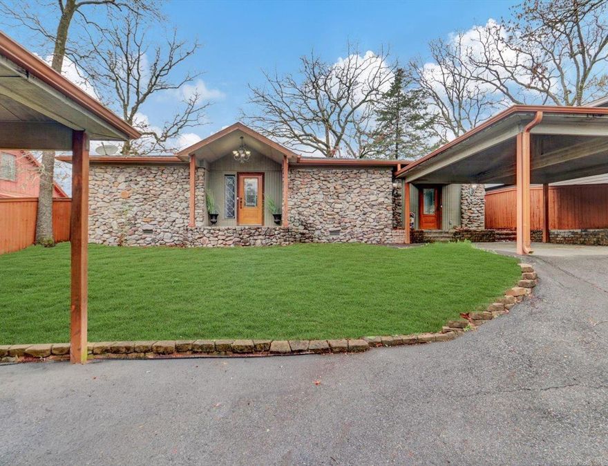 Enjoy spectacular panoramic lake and mountain views from this well-maintained 3-bedroom, 2.5-bath home overlooking Lake Catherine in Hot Springs. Positioned to capture the surrounding natural beauty, the home offers a peaceful setting with scenic vistas that can be enjoyed from multiple living areas and outdoor spaces.  Inside, the home features a comfortable and functional layout with multiple areas for relaxing and entertaining. A dedicated game room with pool table creates an inviting gathering space, while a separate home office area provides flexibility for remote work.  The spacious primary suite offers a private retreat, and the updated kitchen features modern appliances along with ample cabinetry for storage and convenience.  Outdoor spaces are ideal for enjoying the expansive lake and mountain views, creating the perfect setting for quiet mornings or entertaining guests.  Located in the Lakeside School District and just minutes from Lake Catherine State Park.   Currently operating as an active short-term rental, this property offers flexibility as a primary residence, second home, or investment opportunity in the Hot Springs area.