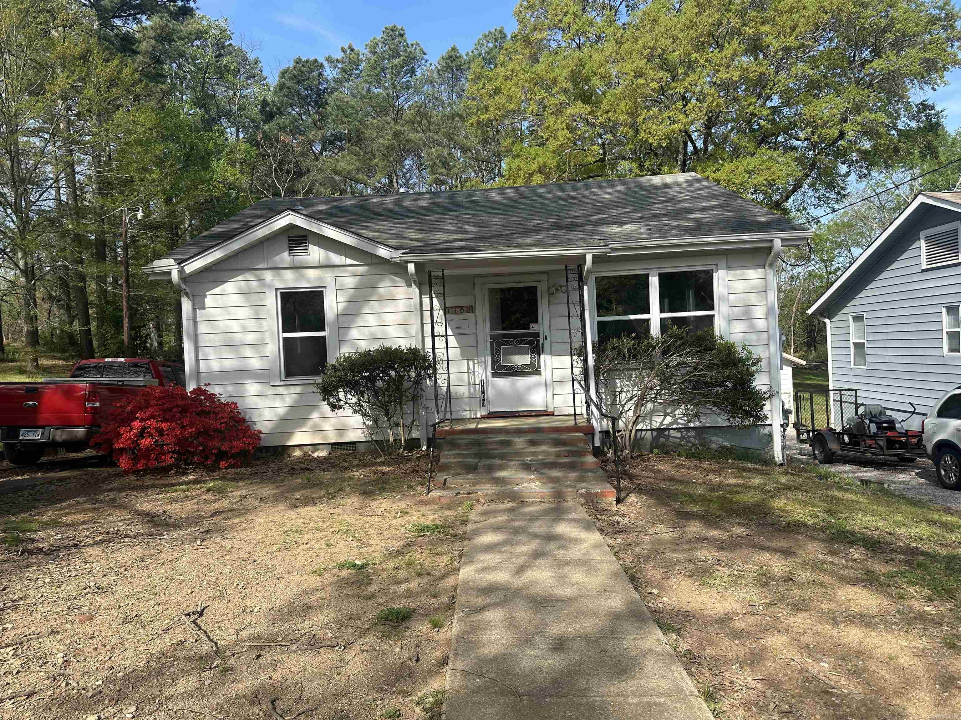 Investor Special! Want a home you can finish your way? This in-town fixer-upper is already prepped for your personal touches! Old sheetrock has been removed and new sheetrock is on-site, ready to install. Major updates include all-new plumbing, a newer water heater, and brand-new cabinets, vanity, and toiletāall ready for installation. Sitting on approx. a ½-acre lot, this cozy home also features a detached garage/shop and is surrounded by beautiful mature trees. Enjoy peaceful mornings on the screened-in back porch, overlooking a serene wooded view. This is a rare opportunity to customize a home in a great location. A true gemācome make it yours!