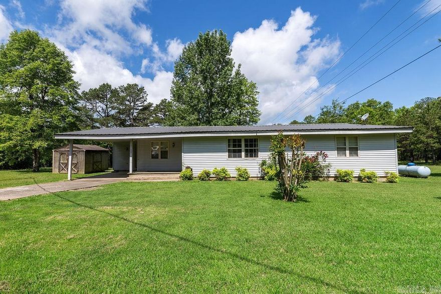 This charming 3-bedroom, 1-bath home offers comfort, space, and natural beauty both inside and out. The spacious living room welcomes you with plenty of room for relaxation or entertaining, while the well-appointed layout ensures functionality throughout the home. In addition to standard utilities, the property includes a private well, providing an additional, reliable water source. Outside, the beautiful yard offers ample space for gardening, outdoor activities, or simply enjoying the serene setting—making this home a perfect blend of practicality and peaceful living.