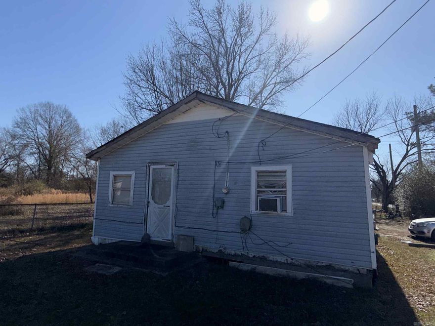 Occupied 2 bedroom, 2 bath home offering an opportunity for renovation and value-add potential. Property is currently lived in and will require significant repairs and updates. Owner financing available for qualified buyers. Shown by appointment only. Ideal for investors or buyers prepared for a project. Property is being sold as-is.  AGENTS SEE REMARKS