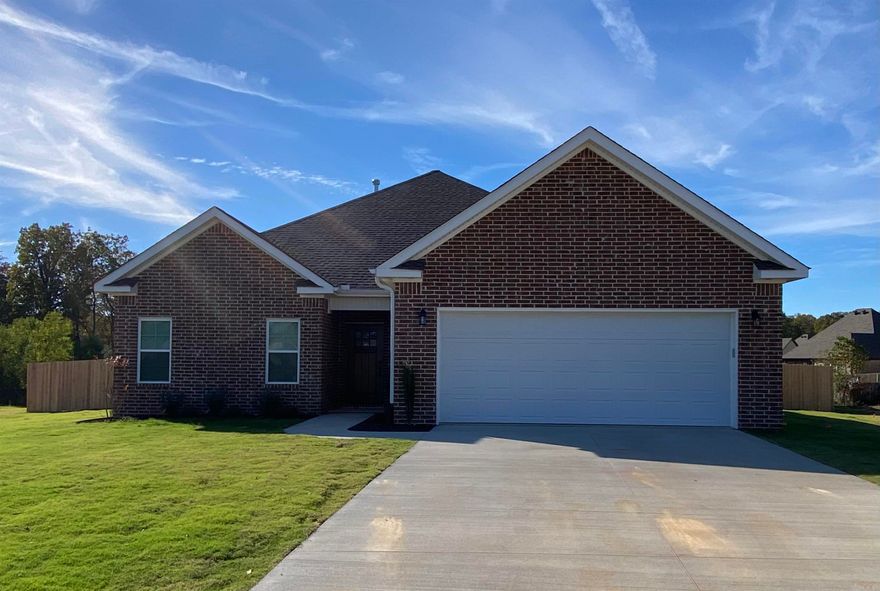 The gorgeous floor plan 3 bedroom, 2 bath. The exterior is covered with all brick and multiple windows surrounding the breakfast area allows plenty of natural light. Tray ceilings are found in the master bedroom, the master bath features double sinks, soaker tub with tile surround, a custom tile shower and an extra-large closet. Enjoy a gas log fireplace, gas cook stove and a gas tankless hot water heater.