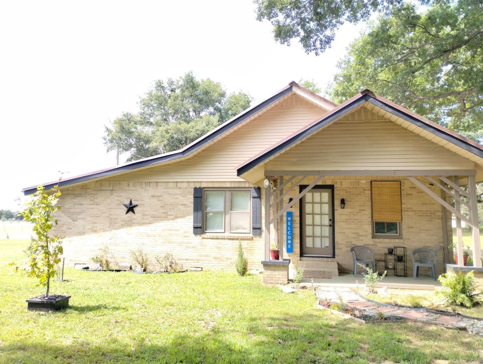 Welcome to 1 Mickey Circle. This home features 2 bedrooms and 2 full bathrooms, a large kitchen and oversized living space, plus a bonus room/den that could easily be converted/utilized as a 3rd bedroom. Outside, you will find a 1 acre lot, with plenty space for outdoor family activities! Enjoy your morning coffee on the private patio, or take in the scenery on the open porch! Located on a quiet street, this home provides all the conveniences of being close to local amenities, while keeping the charming country feel! Give me a call to schedule your private tour today!