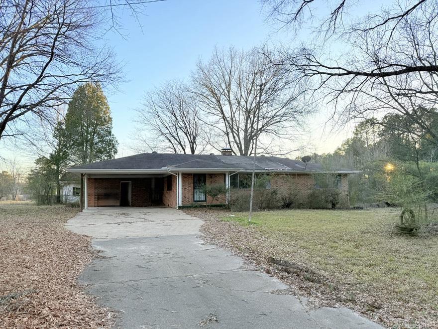 Welcome to 287 Ford Drive, a hidden gem situated on a peaceful 2-acre lot in the desirable subdivision of Oakdale Acres. Equipped with a separate huge shop in the backyard, this spacious home offers endless potential for those with a vision and the desire to personalize a home. There is also a pond located on the back of the parcel. Recent updates include new stainless steel appliances, paint, and new carpet and LVP flooring throughout the home. Note: New ceiling fan in kitchen, bathroom vanity light fixtures, and dishwasher to be installed soon. The expansive 2-acre lot provides plenty of room for outdoor activities, gardening, or even expanding the property. Surrounded by mature trees and offering a private, serene atmosphere, this land is the perfect place to create a homestead or an escape from the hustle and bustle of city living. Call today for a tour! Property sold as-is/where is. No Seller Property Disclosure Available. Owner Occupied offers will be prioritized, HUD's First Look Period applies for the first 30 days with a $350 transaction fee included on the HUD.  Agents please see remarks.