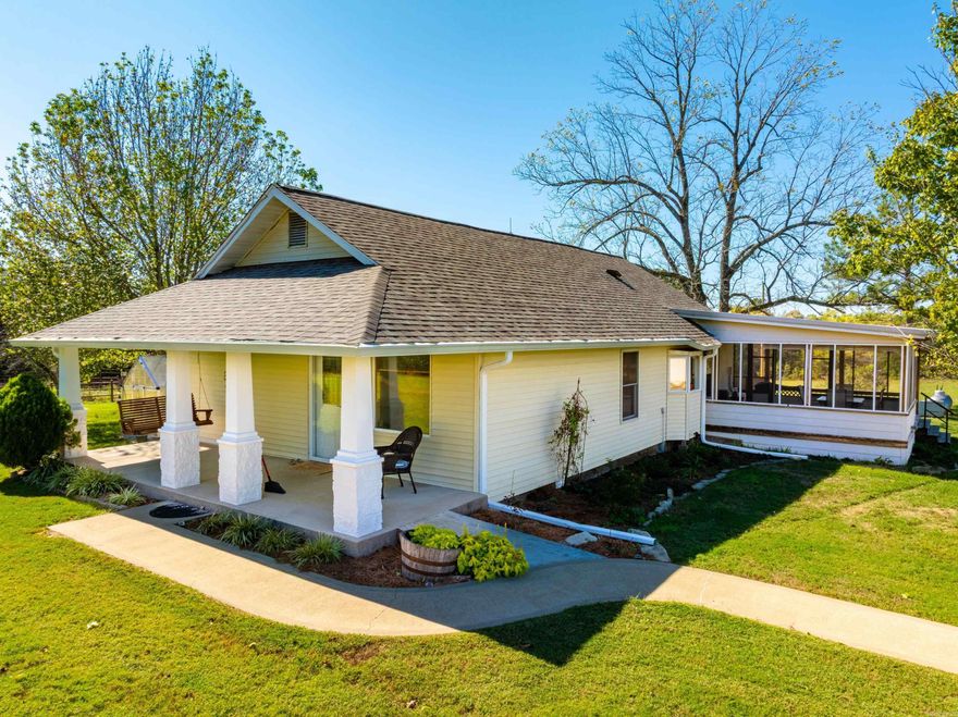 248 +/- Acres • Live Water with Creek and Spring• Custom Home • Ponds • Shop • Viola, Arkansas  Welcome to your Ozark dream retreat! This property is near Viola, Arkansas, captures everything people love about Ozark Living—gently rolling hills, spring-fed pond, a live creek, and a home that feels like a warm embrace the moment you walk in.  The beautiful residence sits on a gentle rise, surrounded by manicured lawns and towering pines. Inside, rich wood tones, updated flooring, and a seamless open layout blend rustic charm with modern comfort. The living area flows to a screened-in porch perfect for sunrise coffee or quiet evenings watching the sunset over the hills.  Step outside and explore:a full house-Generac generator, storm shelter, greenhouse, 30x90 fenced garden, fruit trees, and multiple outbuildings—including a 30x52 insulated Quonset hut shop and 20x40 pole barn. Two sparkling ponds and a spring-fed lake create postcard views, while Big Creek runs nearly a mile through the property, carving scenic bluffs and peaceful swimming holes.  With 55 +/- acres of open ground, pine-lined trails, and abundant wildlife—deer, turkey, even eagles—this land offers endless adventure