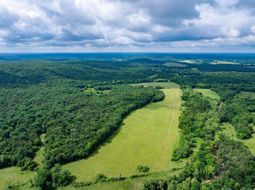 Phenomenal Ozark Property – 150± Acres with Creeks, Pasture, Woods & Airstrip!   This is a rare opportunity to own a one-of-a-kind tract in Sharp County, AR! With 75± acres in lush pasture and 75± acres in mature woods, this property offers year-round live water from Mill Creek and Osburn Creek, plus a private dirt airstrip—perfect for aviation enthusiasts.  Tucked off Mill Creek Rd near Strawberry River Rd and just minutes from Peebles Bluff access to the river, this property is ideal for cattle farming, hunting, recreation, or your dream getaway.  Mill & Osburn Creeks 75± acres pasture / 75± acres woods Electricity throughout Private dirt airstrip Paved road frontage Small barn converted to a cabin (water from spring) Loaded with deer, turkey & wildlife  Whether you’re a hunter, rancher, pilot, or just love the Ozarks—this property has it all! Build a home, fly in on weekends, or enjoy a private retreat surrounded by nature and fresh mountain air.