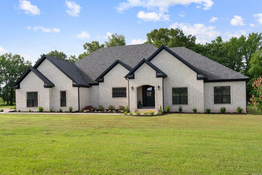Custom Luxury on Nearly 10 Acres in Greenbrier! Welcome to your dream retreat in the Top-Rated Greenbrier School District! This LIKE NEW, custom built 4 bed, 3 bath home offers 2,902 sqft of one-level living space on nearly 10 acres. Enjoy a spacious open/split floor plan with premium wood-look tile throughout, granite countertops, and KitchenAid appliances—including double convection ovens and an induction cooktop (also plumbed for gas). The chef's kitchen includes a 10’ island, walk-in pantry, and coffee bar. Relax on the oversized covered back porch with wooded views through Pella quad-slider doors. Two en-suites feature custom zero-entry tiled showers and primary suite includes a FEMA-rated safe room closet. Extras include surround sound, extra wide doorways, oversized insulated garage with floored attic and extra parking pad. The 40x60 shop is heated &amp; cooled with a kitchenette, full bath, office, dual 14’x10’ overhead doors and outlet for RV hookup—perfect for work or hobbies. Can be purchased with 11.72 acres. See MLS #25020953 This is a rare find, so schedule a tour today! Agents see feature list & remarks.