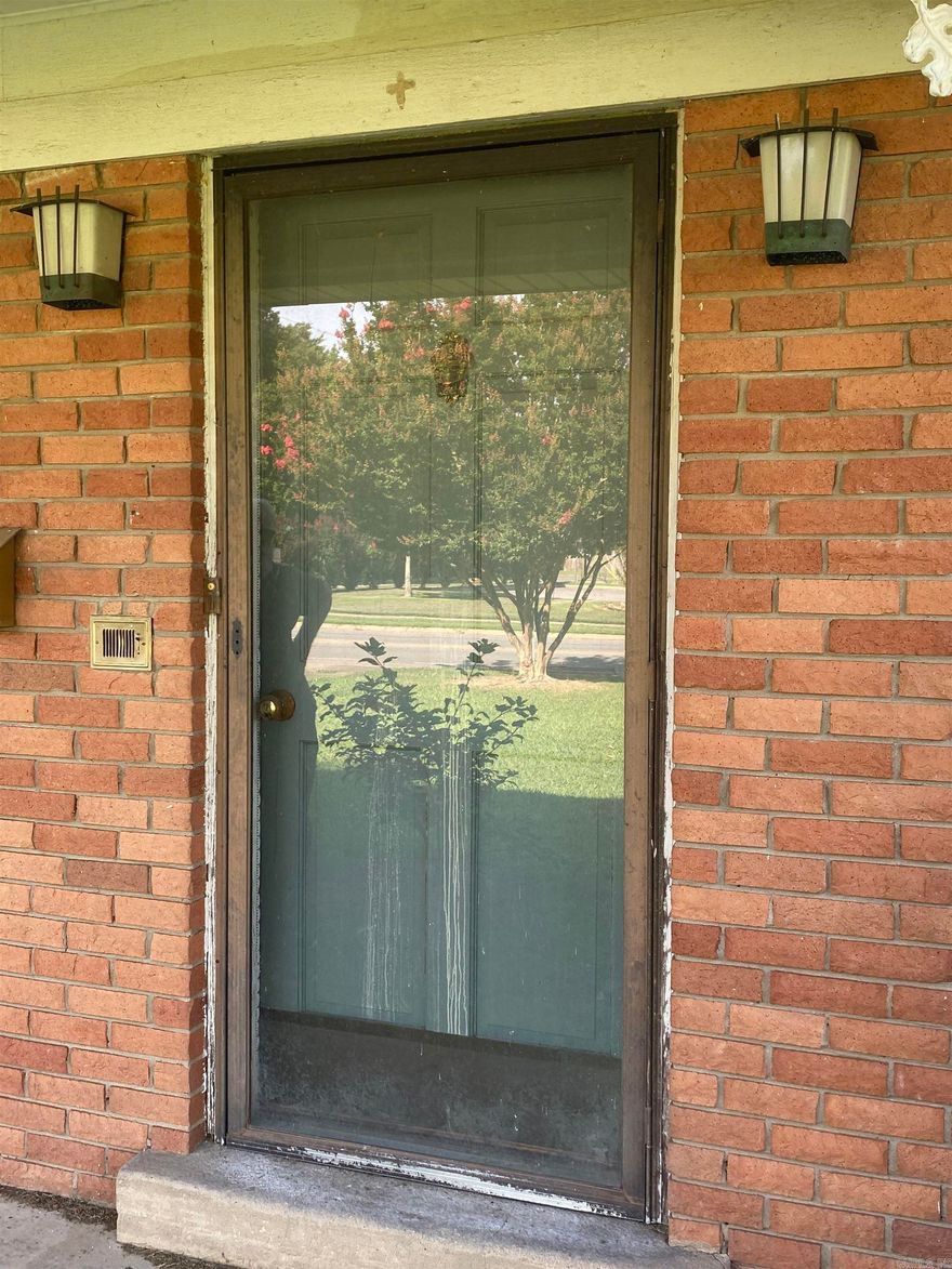 Corner lot in the city limits of Conway.  It is located on the corner of Donaghey Ave 150 'wide front.  The home has good bones to it but has not been up dated.  Seller is selling the property as is. It is presently zoned as R-2A. See additional MLS to buying more land.