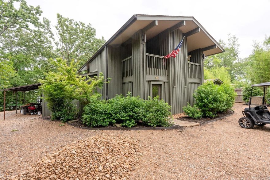 Eden Isle furnished LAKEFRONT!!! This might be the very closest house to water on the entire island! Spectacular lake views; you can hear the waves hitting the beach from the patio and deck! 4-bedrooms, 4.5-baths, Eden Isle Architecture with lots of glass (ALL rooms view the lake!)! Both upstairs bedrooms have private decks! Located at the end of Fox Chase Road past the marina, the location simply can't be beat! And yes, the water in the pictures really is that close!!!  130 feet of lakeside frontage!!!