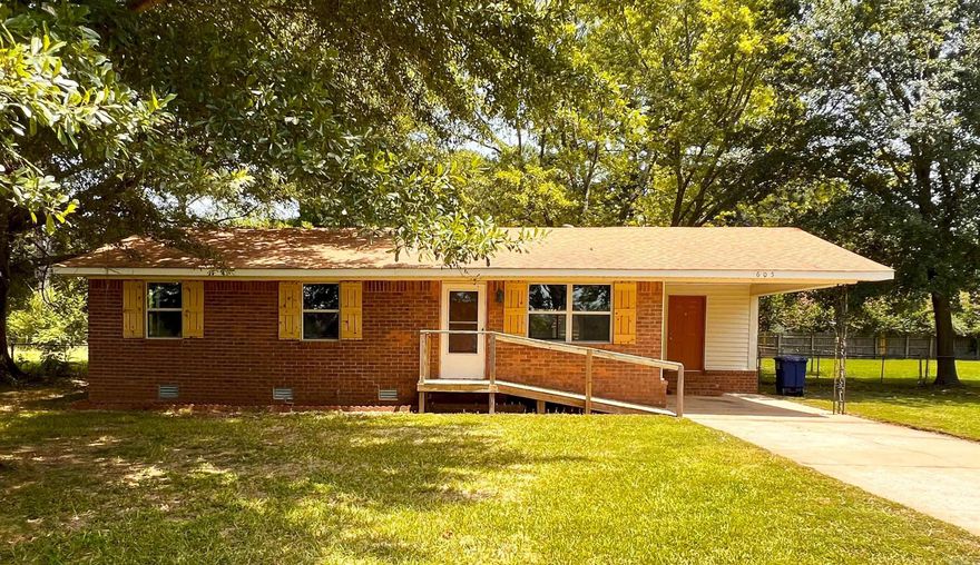 Newly remodeled inside and out! Brand new insulated windows throughout. Granite countertops in the kitchen. Outside sits a large, covered deck perfect for grilling and entertaining. The oversized fenced in backyard provides an idyllic space for kids to play or dogs to run around. Multiple storage buildings in back yard. Large trees provide an abundance of shade as well! A must see!