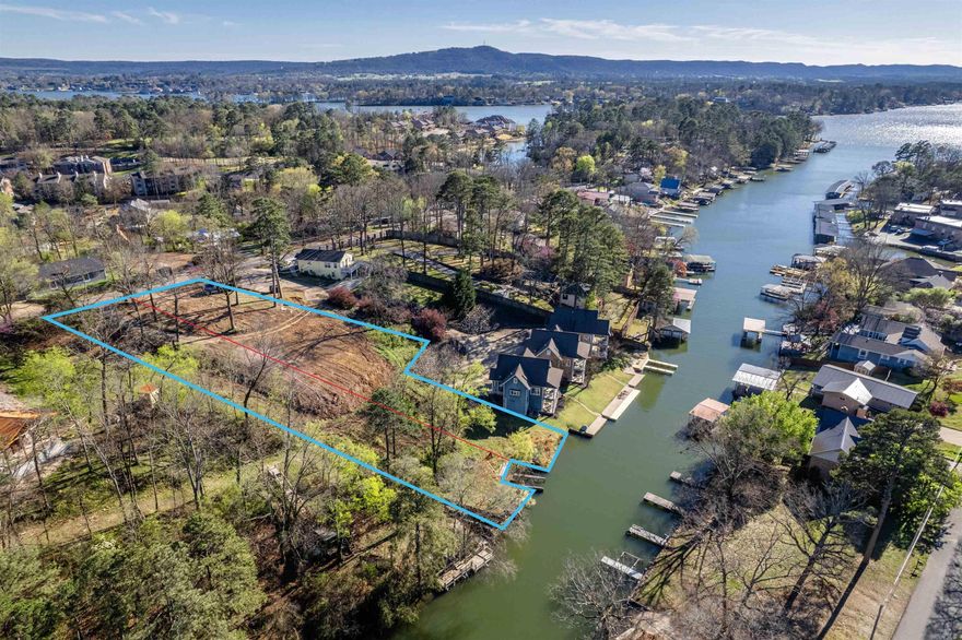 What a Great Spot to Build your Lakefront Retreat on Lake Hamilton!  This Lot is located on Burchwood Bay Road, just down from Sam's Pizza Pub!  With a Seawall in Place and a Permit in Place to Build a Boat Dock, this Lot is Prime for a Lakefront Retreat without Breaking the Bank!  Call Today for More Information.  Survey on File.  Part of Lot 15, All of Lot 16, LACKEYS LAKE FRONT #1, Garland County, AR.