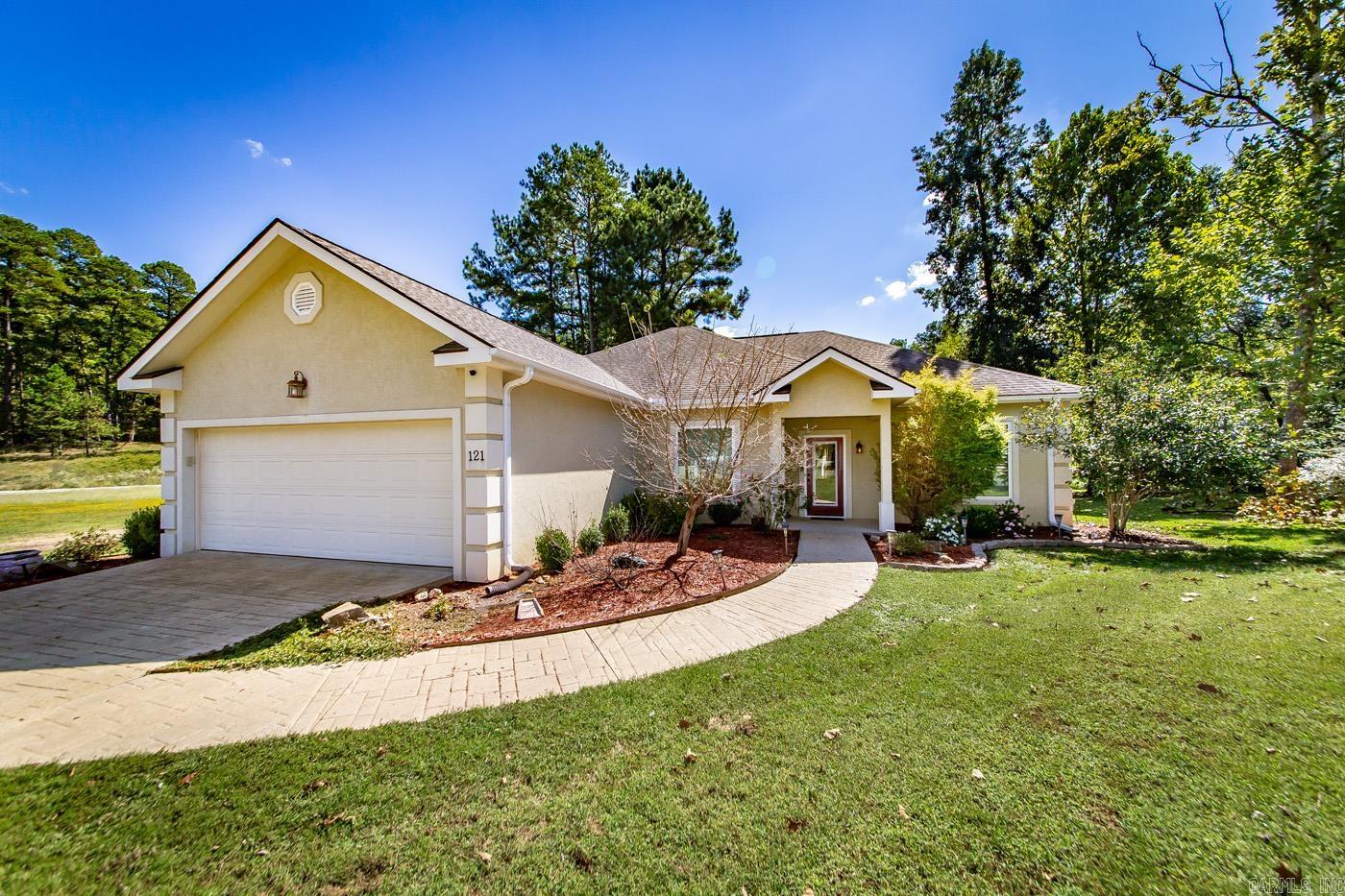 So many checks, so many boxes, say hello to your forever home! Located on a large corner lot in the all inclusive Diamondhead Community in Lakeside School District just 2 miles from Lake Catherine State Park. While indoors, enjoy your vaulted ceilings, granite counter tops, loft storage above your two car garage, warm up next to the new electric fire place and design your bonus room into the office or home gym of your dreams. Step outside to relax under your new pergola or explore the community's golf courses, club house, tennis/pickleball courts, olympic size swimming pool, marina, trails, and much more! 3 bed, 2 full bath, 1918 sq ft, and all electric. A must see!