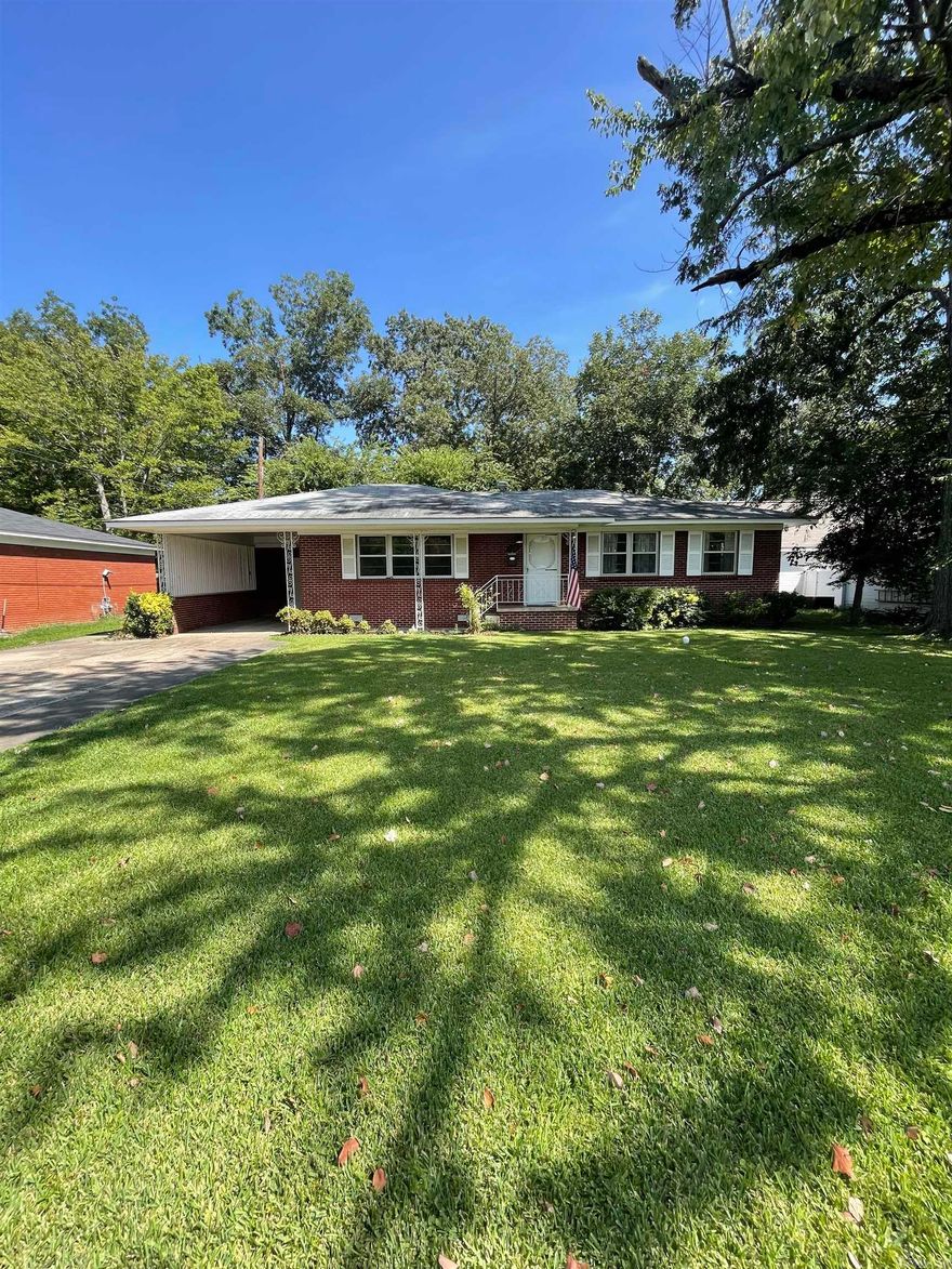 Welcome to 820 Ash Street! This charming home is in the heart of the historic district of Conway, just minutes from downtown shops, places of worship, schools, and the best food in town. The main house has two bedrooms, two bathrooms, and original hardwood floors. The addition includes a bedroom, bathroom, and large living area with gas fireplace making this a perfect home for a multi-generational family. This convenient layout could also be easily converted into a duplex for the savvy investor. The sunroom and spacious backyard provide plenty of space for entertainment and relaxation. The workshop and she shed can be utilized as a hobby space or for storage. With its prime location and inviting atmosphere, this property is perfect for a first-time homebuyer, investor, or growing family.