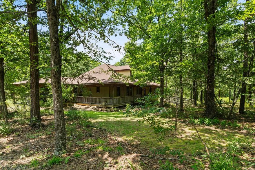 A CUSTOM-BUILT HOME THAT SITS ON 1.80 ACRES, NESTLED IN THE TREES IN SOUTHWEST CONWAY. THIS TOTAL ELECTRIC HOME HAS PORCHES ON 3 SIDES, A CARPORT, GARAGE, STORAGE BUILDINGS AND IS FENCED. THE MAIN FLOOR HAS 2 BEDROOMS 1.5 BATHS. ONE FULL BATH HAS A TUB AND THE OTHER FULL BATH HAS A CUSTOM WALK IN SHOWER. THE MAIN FLOOR HAS 1970 SQ FT H&C, THERE IS AN ADDITONAL 400 SQ FT UPSTAIRS THAT IS NOW HEATED AND COOLED. THERE IS AN UNFINISHED BASEMENT THAT HOUSES THE MECHANICALS OF THE HOME. THE KITCHE HAS AN ISLAND WITH A PREP SINK, AN ABUNDANCE OF CABINETS AND HAS AN OPEN CONCEPT LIVING CONCEPT. THERE IS ALSO A FLEX SPACE. THE MUD ROOM HAS AN EXTERIOR DOOR FOR EASY ACCESS TO CLEAN UP WHEN COMING FROM THE OUTSIDE. THERE IS A FEMA SAFE ROOM ON THE MAIN FLOOR. **SEE APPOINTMENT INSTRUCTIONS**