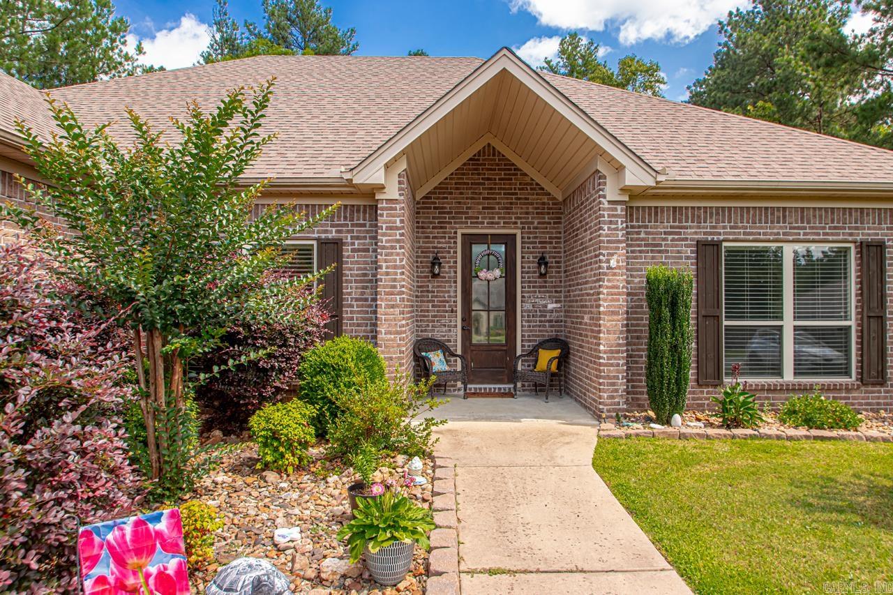 What a great opportunity to own a beautiful home in Pinewood Estates on .92 acre lot. There is so much detail in this home: High ceiling, open floor plan with large kitchen island, custom cabinets, granite counter tops, split floor plan, rock fireplace, large closets, wonderful screened in back porch, French drain in backyard for irrigation, water running to shop with frost-proof hydrant, 16x24 Gable extension to shop. Shop is 36x24. Shop is wired to back feed house with generator from shop. Shop has a heater hardwired into the electrical. Second driveway built to shop. Flagstone patio added. 10x10 shed inside the fence and stone firepit in the backyard. Tornado shelter in the garage floor. Agents See REMARKS!