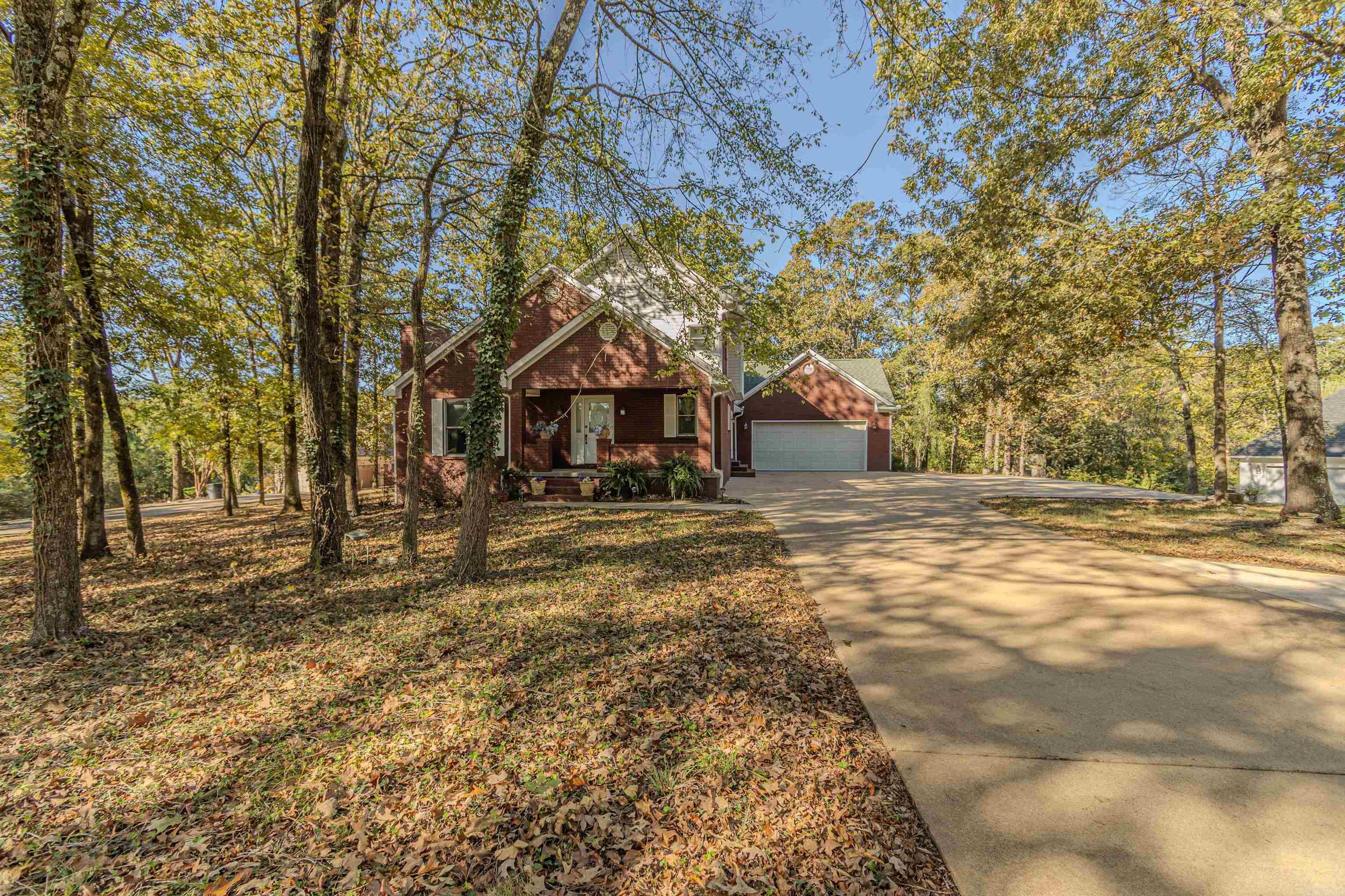 Spacious Brick Home on 1.20 Acres in Southwest Jonesboro This beautiful 3,686 sq. ft. home offers 3 bedrooms and 3.5 baths, blending comfort and style throughout. The main level features a welcoming living room with hardwood flooring and a cozy fireplace, a dining area, and a kitchen with granite countertops, subway tile backsplash, and stainless steel appliances. A convenient laundry room with sink and a spacious primary suite with a private office complete the main floor. The updated primary bath includes a stunning 7x3.5 ft tile walk-in shower and double vanity. Upstairs, youāll find two additional bedrooms and a full bath. The walk-out basement provides even more living space with new carpet, an additional room, a fireplace, and abundant storage. Situated on a large, wooded 1.20-acre lot on the southwest side of Jonesboro, this property offers both privacy and convenienceāperfect for those seeking space and comfort in a serene setting.