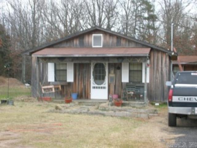 approximately 8.77 ac located on Hwy 167 with highway frontage, approximately 15 miles north of Bald Knob and approximately 8 miles South of Pleasant Plains Property has 1 bed and 2 living rooms