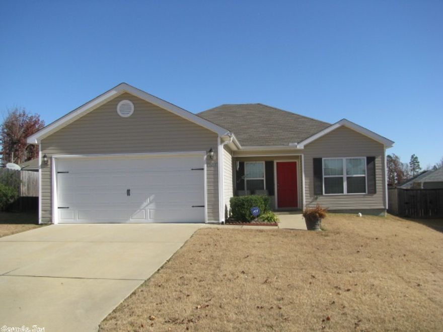 This lovely home built by Ken Young, would be perfect for first time home buyers! Enjoy low utility bills with the energy efficient design. Charming open floor plan with custom oak cabinets. Well designed queen's kitchen with plenty of cabinet & counter space and large family dining area which opens into the great room. Split bedroom plan. Master bedroom has large walk-in closet. Pretty, nuetral colors throughout. Separate laundry room. Wood privacy fence. Two car garage. Security system. SHOW & SELL!!