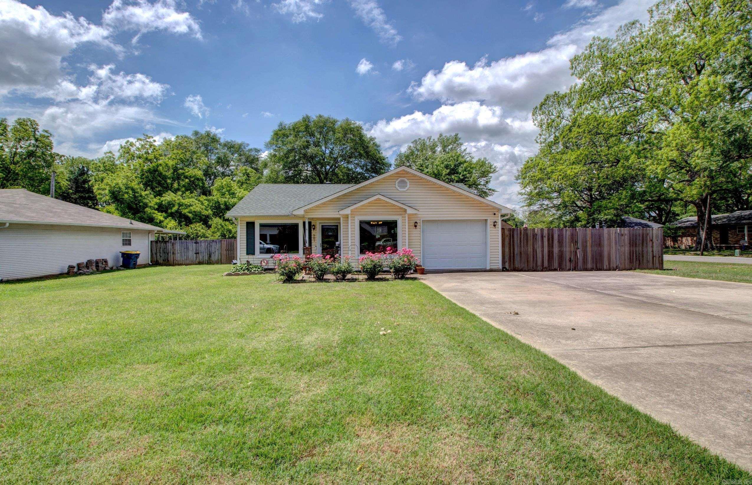 Check out this adorable home that is conveniently located in the heart of Cabot and within walking distance to the high school. The 2-bedroom, 2-bath home is move-in ready and would be perfect for a first-time home buyer! Some of the recent upgrades include a new roof, new windows and doors, updated flooring, siding, a wood privacy fence and a whole-home generator. The spacious back yard features an oversized patio and two storage sheds that are ideal for storing all of your outdoor equipment and gardening supplies. This home is a must see! Call today to schedule your showing. See agent remarks!