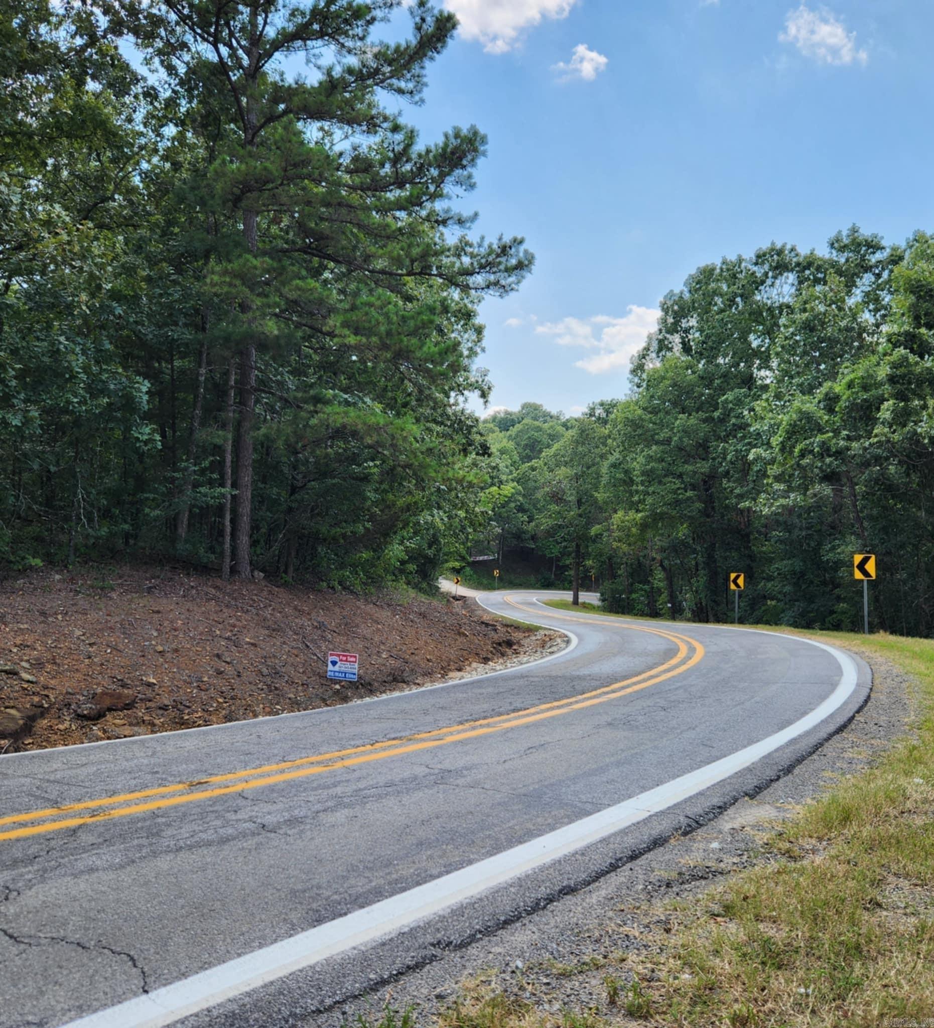 wooded, sloped, private, minutes from Greer's Ferry Lake