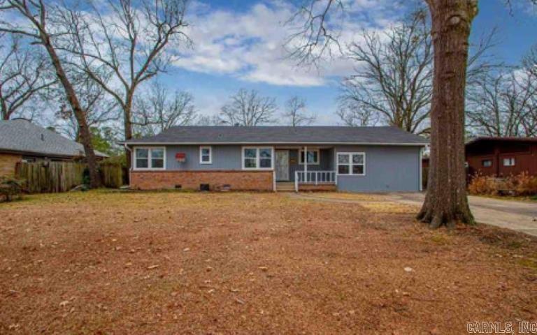 Completely remodeled beautiful home in the heart of Lakewood Subdivision. New roof installed when home was purchased in 2021 and New Heating and A/C unit in 2019. New Vinyl windows throughout home in 2017. Home was just completely repainted inside and out in December 2020. 4 Bedrooms 3 full baths. There was a new master suite added in 2020 with tile flooring in master bathroom and Laminate wood flooring in the sitting area and bedroom. Hardwood floors throughout the rest of home with tile flooring in wet areas. Also, new extended deck added in 2024!