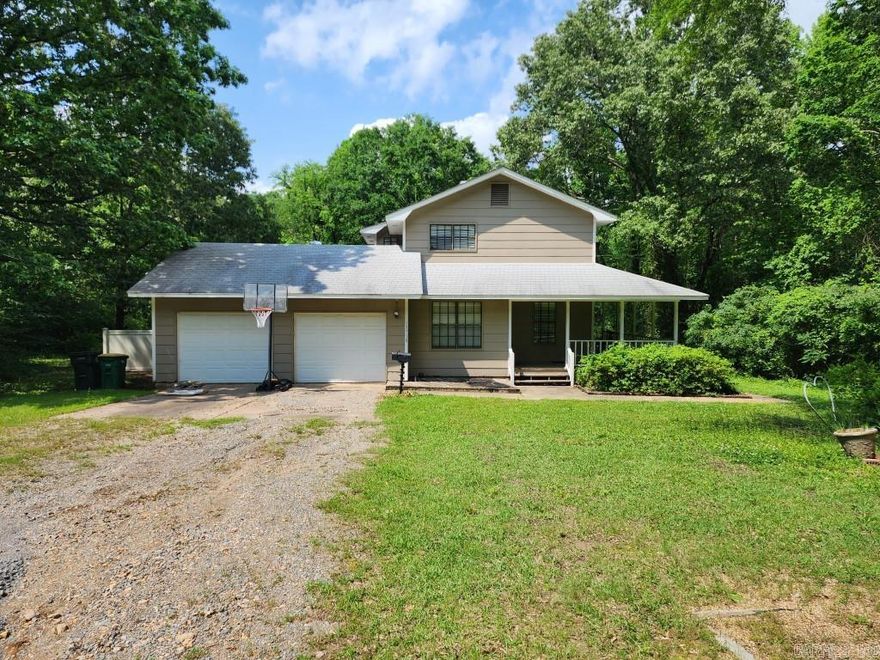 Welcome home to 10710 Sharon Drive in Mabelvale.  Enjoys this classic home sitting on 5.41 acres providing private, yet convenient, location.  Some updates include range 2022, upstairs HVAC 2019.  Just needs a little TLC.  Downstairs: kitchen, eat in kitchen, full bath, living room, laundry room and bonus room (potential 4th bdrm?).  Upstairs: 3 bedrooms, 2 full baths.  Wonderful wrap-around porch to enjoy the outdoor view and wooded privacy.  Agents: see showing instructions and agent remarks.