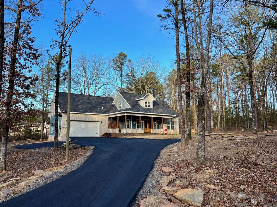 Newly-constructed furnished home! Offers a great space for entertaining in a neighborhood with access to the Little Red River. This 3 bedroom, 2 bath home features a beautiful stone fireplace, huge open kitchen, large laundry room with built in washer and dryer, and even a pet washing sink. The oversized garage includes its own ice machine. The master has a large walk-in closet and an attached office space. The outdoor space features a covered patio with a hot tub. A detached 30x30 shop is also included. Make this your permanent home or vacation getaway today!