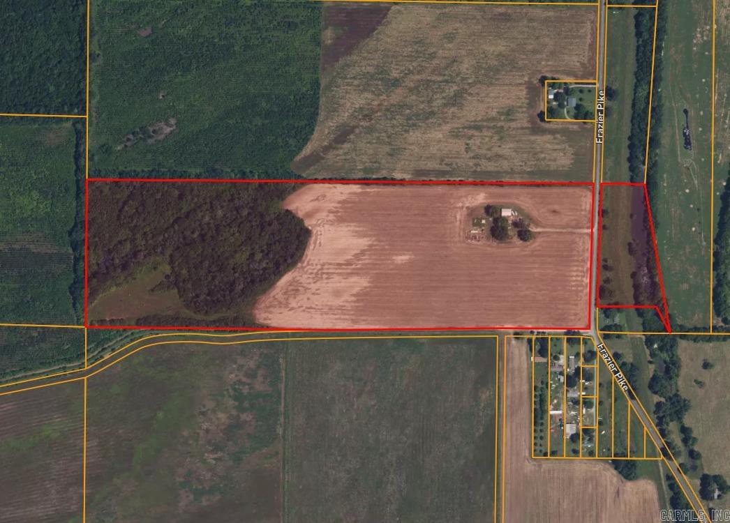 74.40 acres of agri, pasture, and timber. Includes 60x40 metal building which includes 2 bdrms and 2 bath, with living room, kitchen and laundry. 2 overhead doors. Include city water, power and septic. See agent and showing remarks.