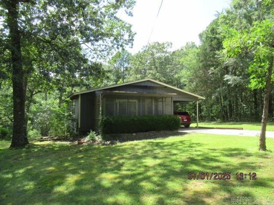 SELLER MOTIVATED, MAKE AN OFFER! Is this the hottest deal of the summer?  You can make your mark on this conveniently located home that is FIVE minutes from the marina.  Enjoy your morning coffee on the screened-in front porch.  With 2 bedrooms and 1 bath, along with a sunroom and mudroom off the carport, you will be set for efficient living. Call to see it today!