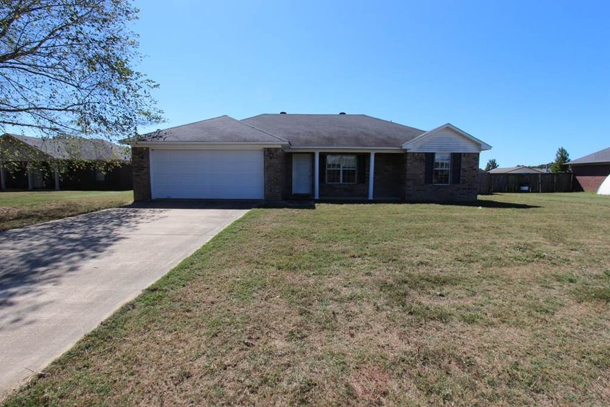 Cute Brick home with huge back yard. Split floor plan with separate utility room.  Call today! Agents see agent remarks for info on submitting offer.