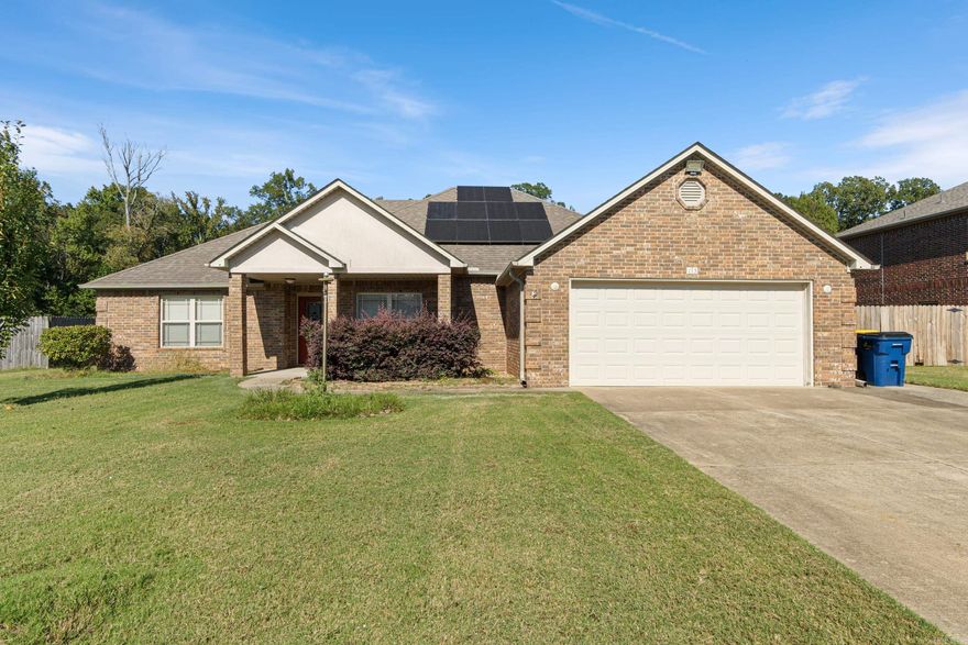 Beautiful 4 Bedroom home near Cabot Schools! This 2.063 Sq Ft home offers an inviting open concept layout with 4 bedrooms and 3 baths in a desirable split floor plan. The spacious living and dining areas feature elegant arched doorways creating a perfect flow. The primary suite includes a large bedroom and the bath includes double vanity, dual closets, a jetted tub and a separate shower for relaxing comfort. You'll also appreciate the freshly painted interior and brand new carpet in the bedrooms. In the kitchen you will find granite countertops, a new dishwasher, ice maker hookup and a floating island. The home is all electric and is equipped with solar panels (that are paid off) smart light switches and is wired for CAT6/10 gig for fast connectivity. Outside, enjoy a covered back porch plus an additional open patio overlooking a yard that features nectarine and peach trees, blueberries, honeysuckle and wild blackberries. Located close to Cabot Schools (South), this home combines modern efficiency with everyday comfort - ready for you to move in and enjoy!