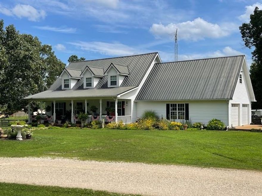 50 Acre Arkansas Homestead...Encompasses a lifetime of improvements that are both practical & aesthetically superb. 3 Bdrm-2 Bath residence, barns w/stalls, arena, greenhouse-she shed, fencing/cross-fencing, 2 water wells, public water, pastures, saferoom, sewing/hobby room, garage. From the comfort of 2 living areas, fireplace and heat-pumps, to the fabulous automatic waterers, pastures, large animal grooming stations and hundreds of feet of steel pipe fencing, live your dream with easy access, beautiful shade trees and flowers. All located in the gentle terrain of the Ozarks, a school of choice region, within 15 to 40 minutes of most shopping, dining and health care needs. It's definitely a horse, cattle or other livestock owner's dream.