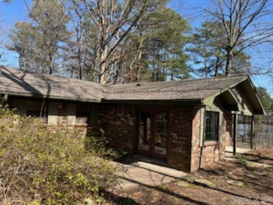 Escape to your own private retreat with this 3-bedroom, 1-bathroom home nestled on 25 unrestricted acres of land! Built in the 1980s, this property offers endless potential for those looking to create a homestead or hunting getaway. Located just 7 miles from I-530 in a dead-end cul-de-sac, this hidden gem provides the perfect balance of privacy and accessibility. Enjoy the stocked pond, ideal for fishing, and the abundance of deer and wildlife roaming the property. The property also includes a shop with electricity, a power pole, and a horse barn—ideal for storage, livestock, or hobby farming. Whether you dream of raising animals, gardening, or simply enjoying the great outdoors, this property offers the freedom to make it your own. New Roof in 2022. New Dishwasher. Home is being sold as-is, ready for your vision and personal touch. Don't miss this opportunity to own a slice of country living with no restrictions! Schedule your showing today!